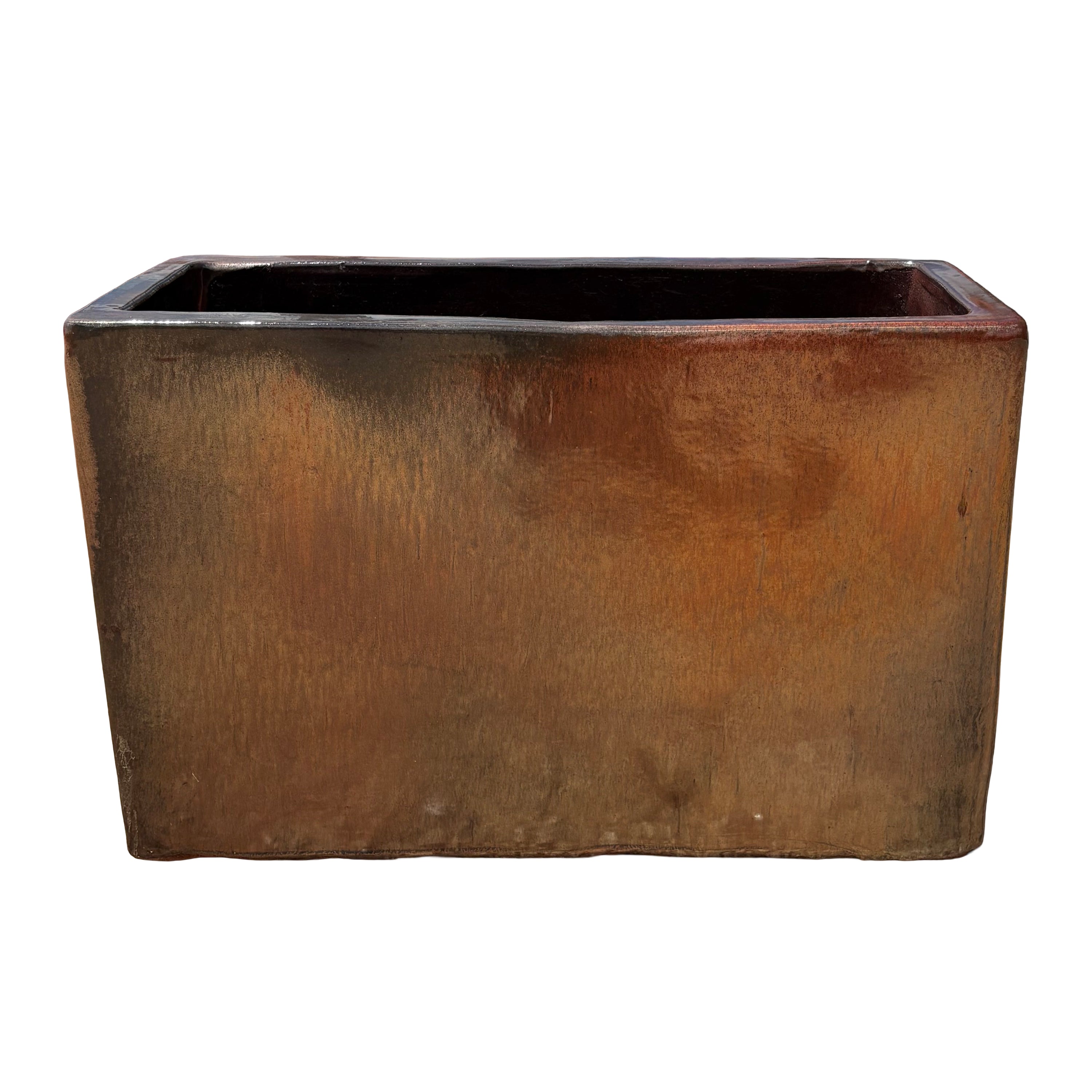 Oxide glazed rectangular ceramic planter shown from a wide angled perspective, highlighting its earthy tones and textured glossy finish.