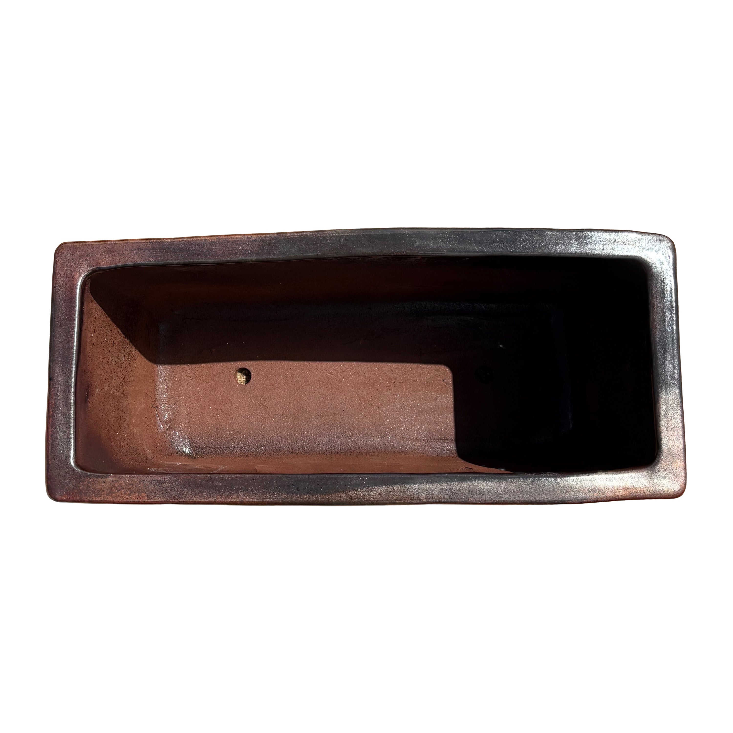 Top view of the oxide glazed rectangular ceramic planter showing the elongated planting space and smooth interior surface.