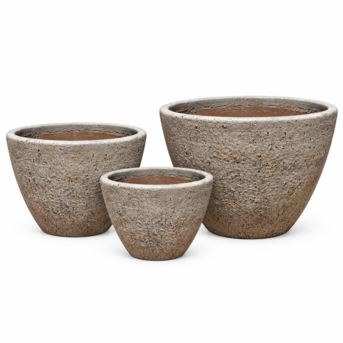 Three textured concrete planters in different sizes arranged on a clean white background.