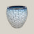 White honeycomb plant pot with blueish rim
