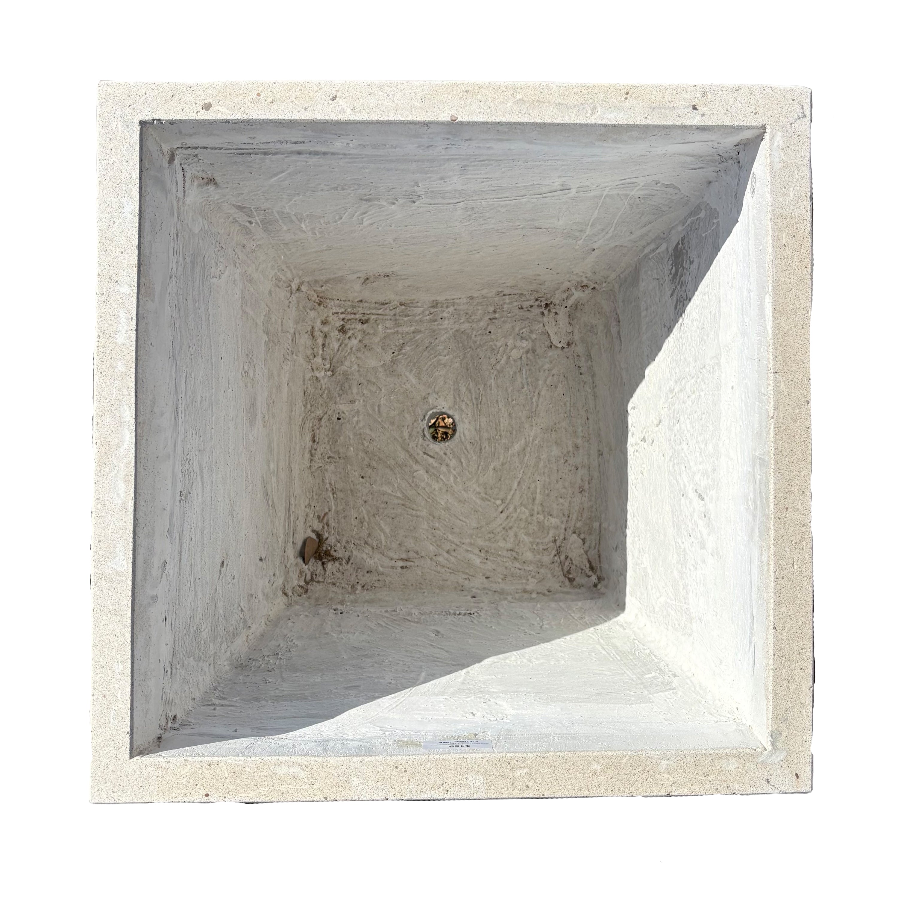 Top-down view of white tapered square fiberstone planter, emphasizing its square opening and balanced proportions.