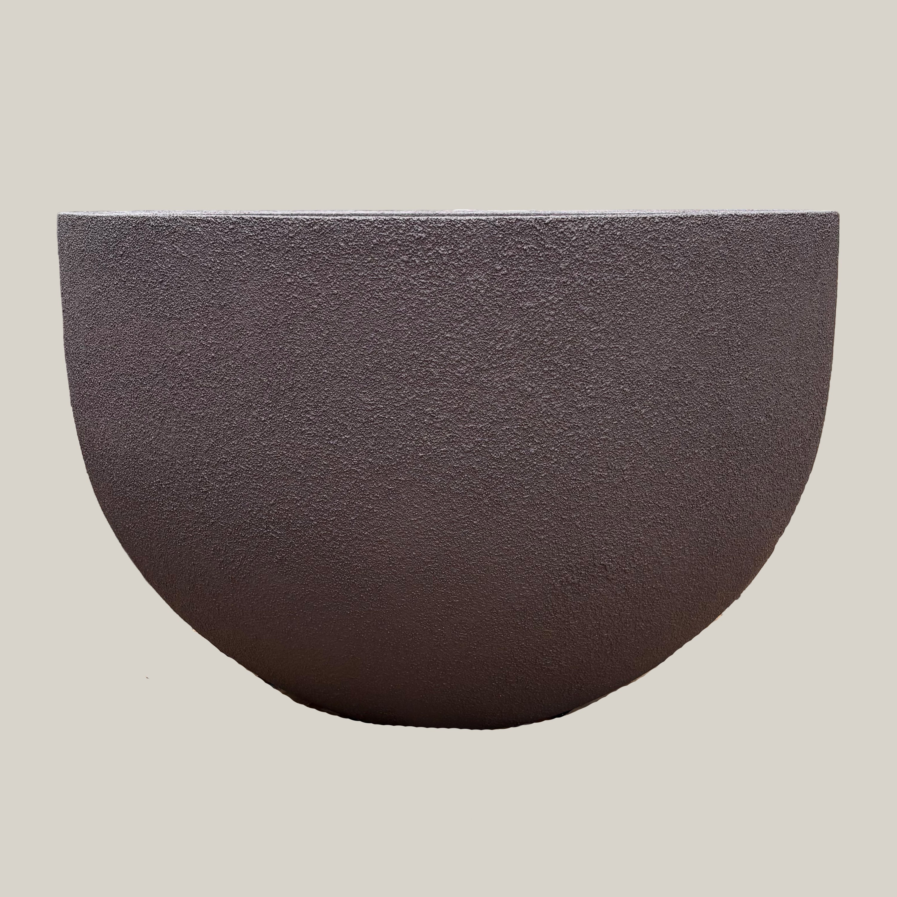 Front view of brown large poly pot with clean modern profile and smooth rounded silhouette in earthy brown tone