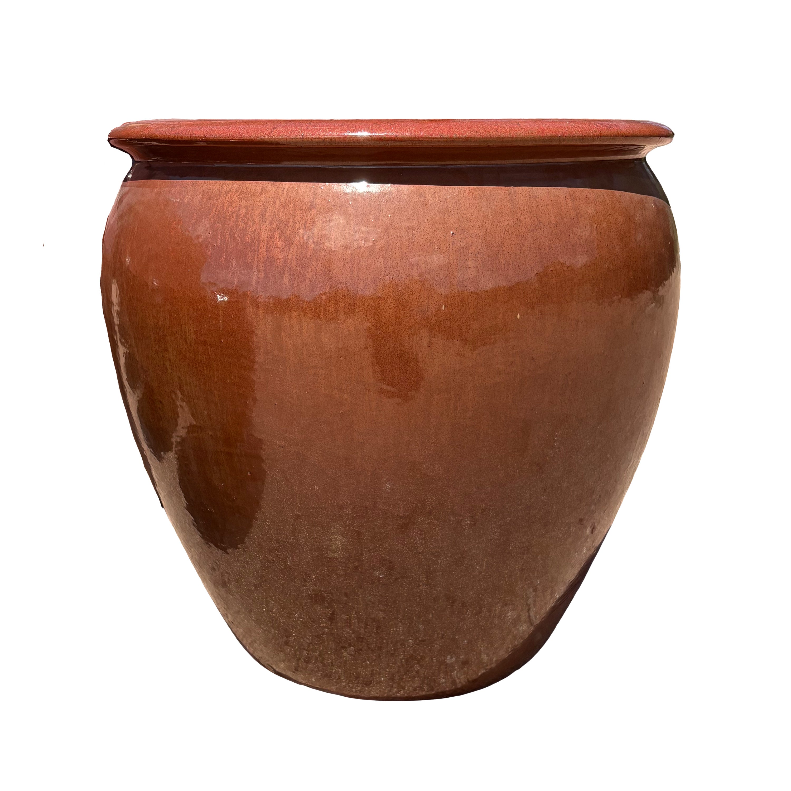 Front view of round copper red ceramic jar planter with rounded profile and rich copper red glazed finish