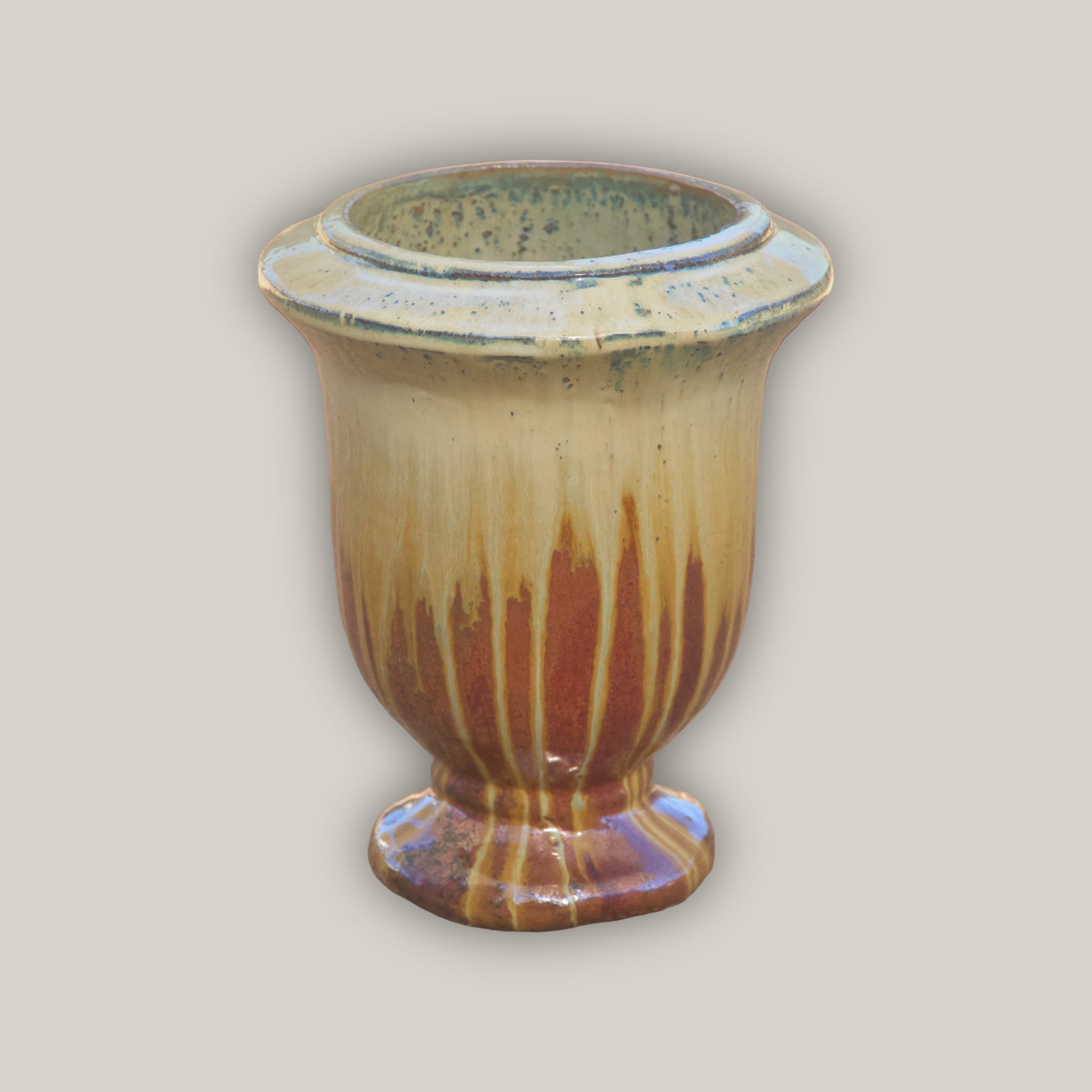Copper urn planter with cream dripping effect