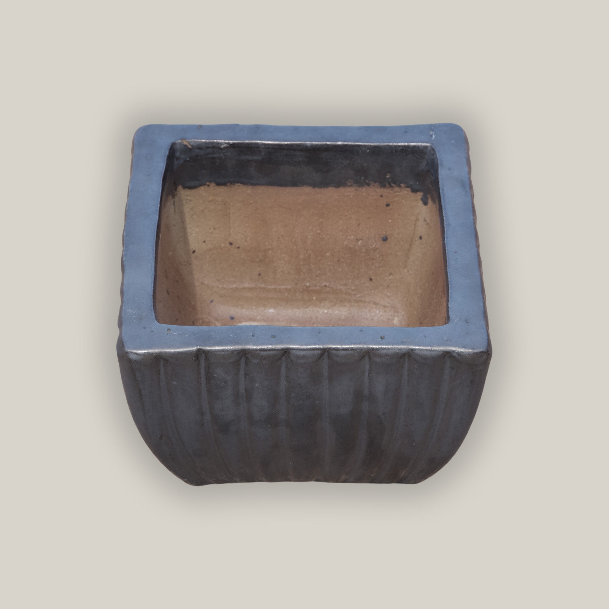 9829C8 - Matte Black Tapered Square Ceramic Ribbed Planter - Low
