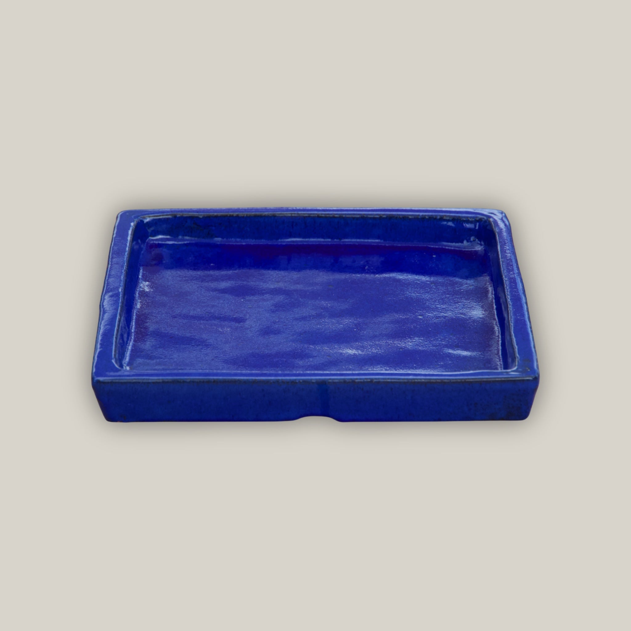 blue plant pot saucers Square Falling Blue Ceramic Plant Saucer