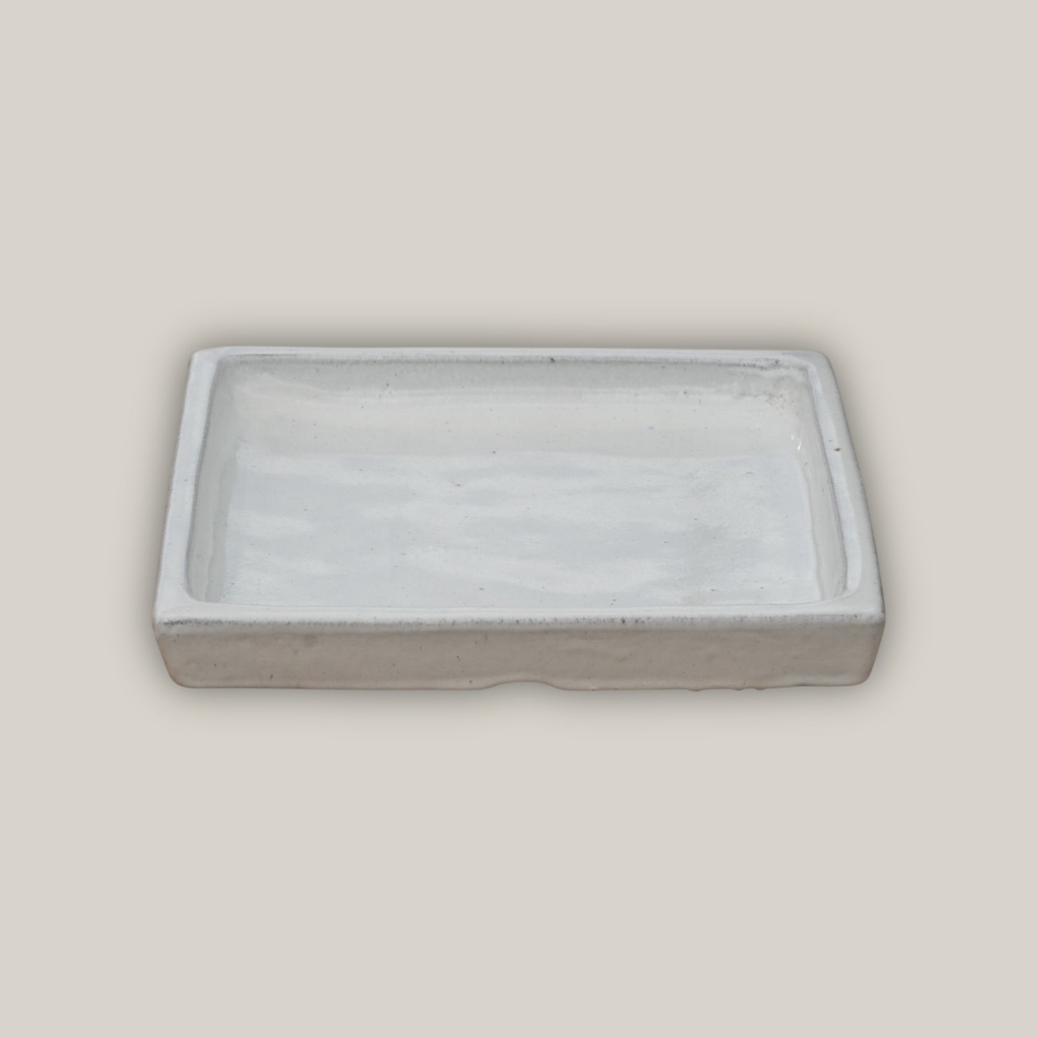 White square plant saucer made from ecofriendly ceramic