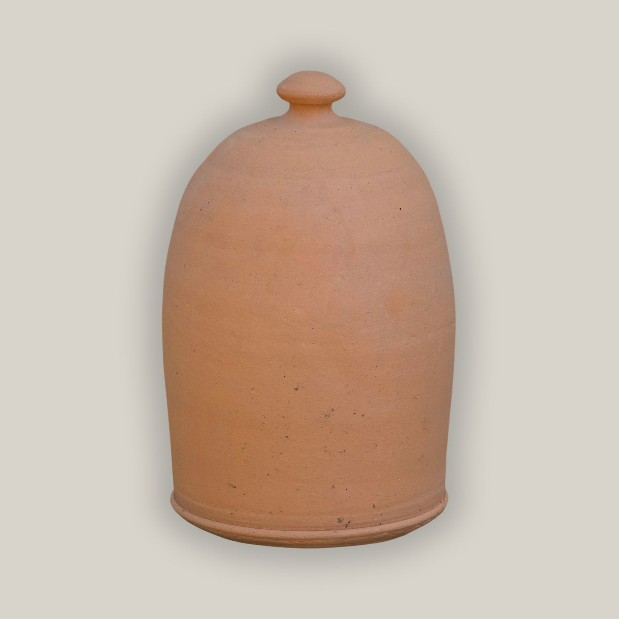Terracotta bird house with natural rustic finish