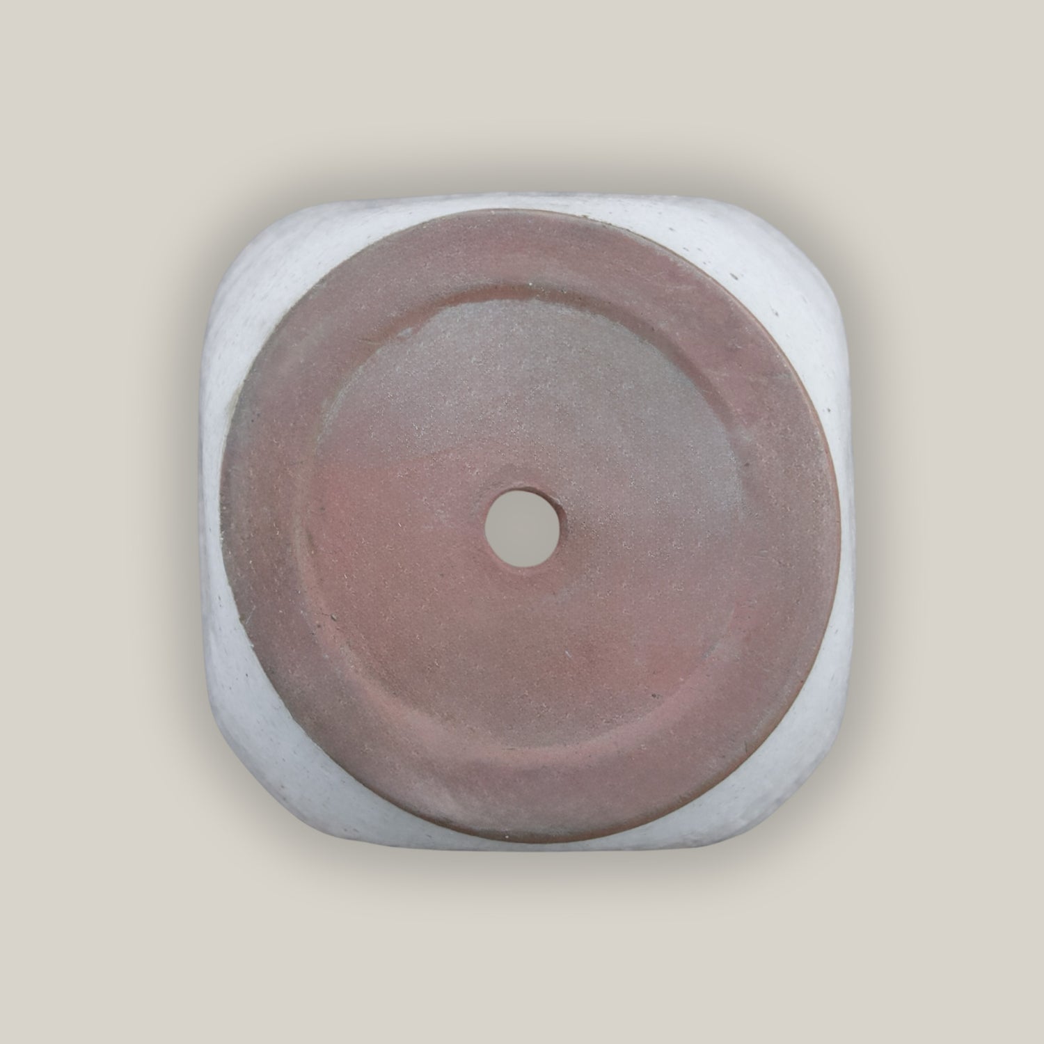 Bottom of White square planter with modern tapered design