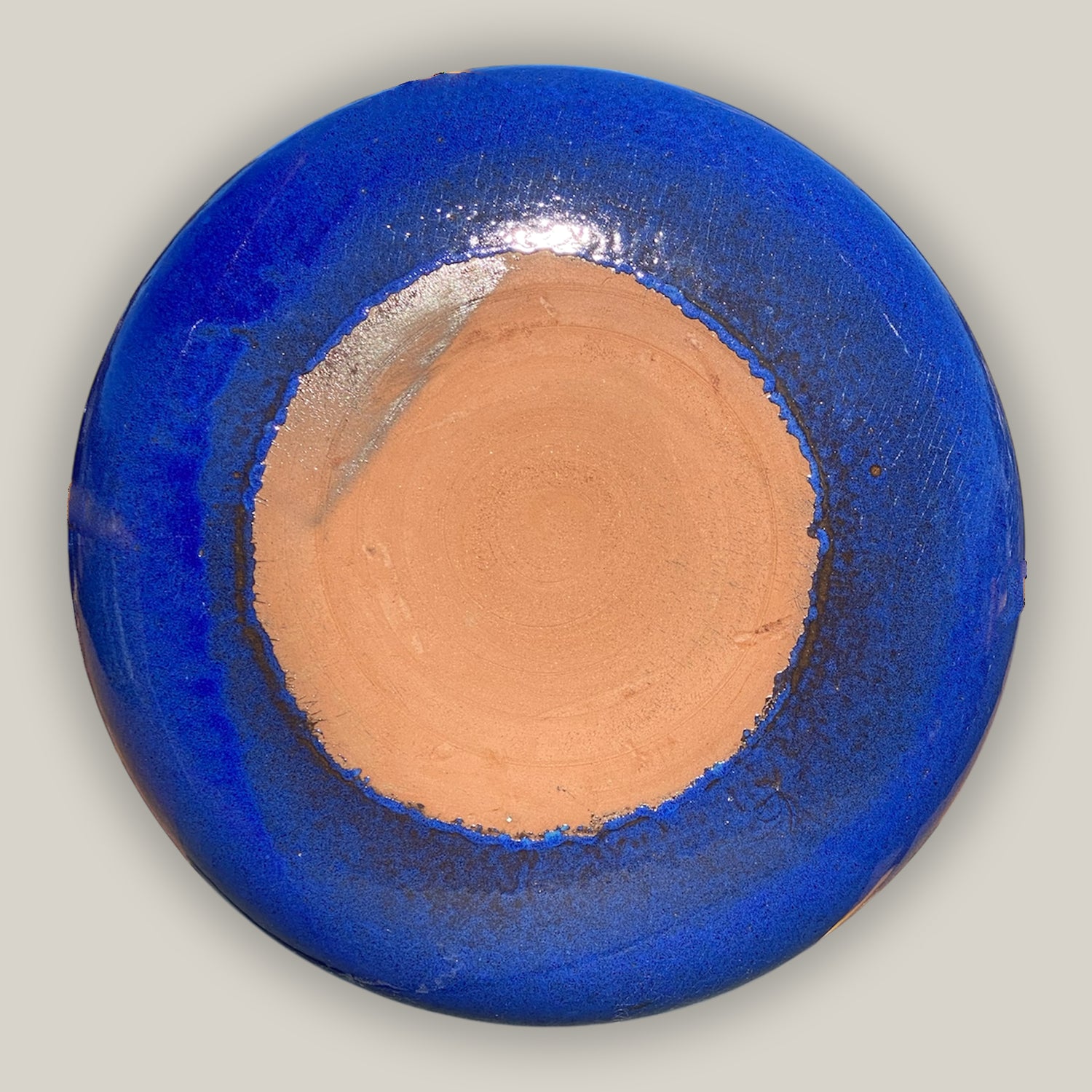 Back of Blue ceramic birdbath bowl with hand-glazed finish