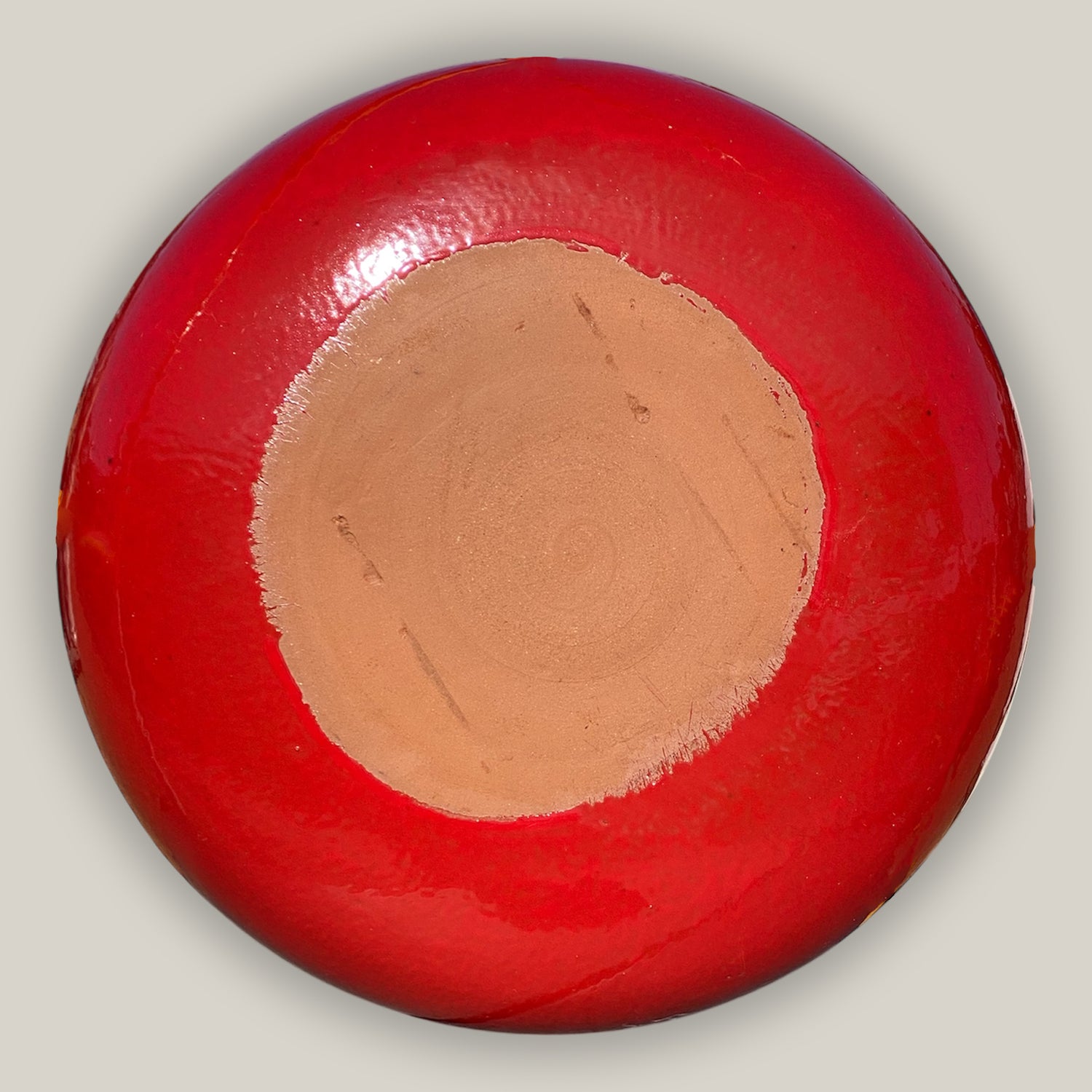 Back of Handcrafted Red ceramic birdbath bowl