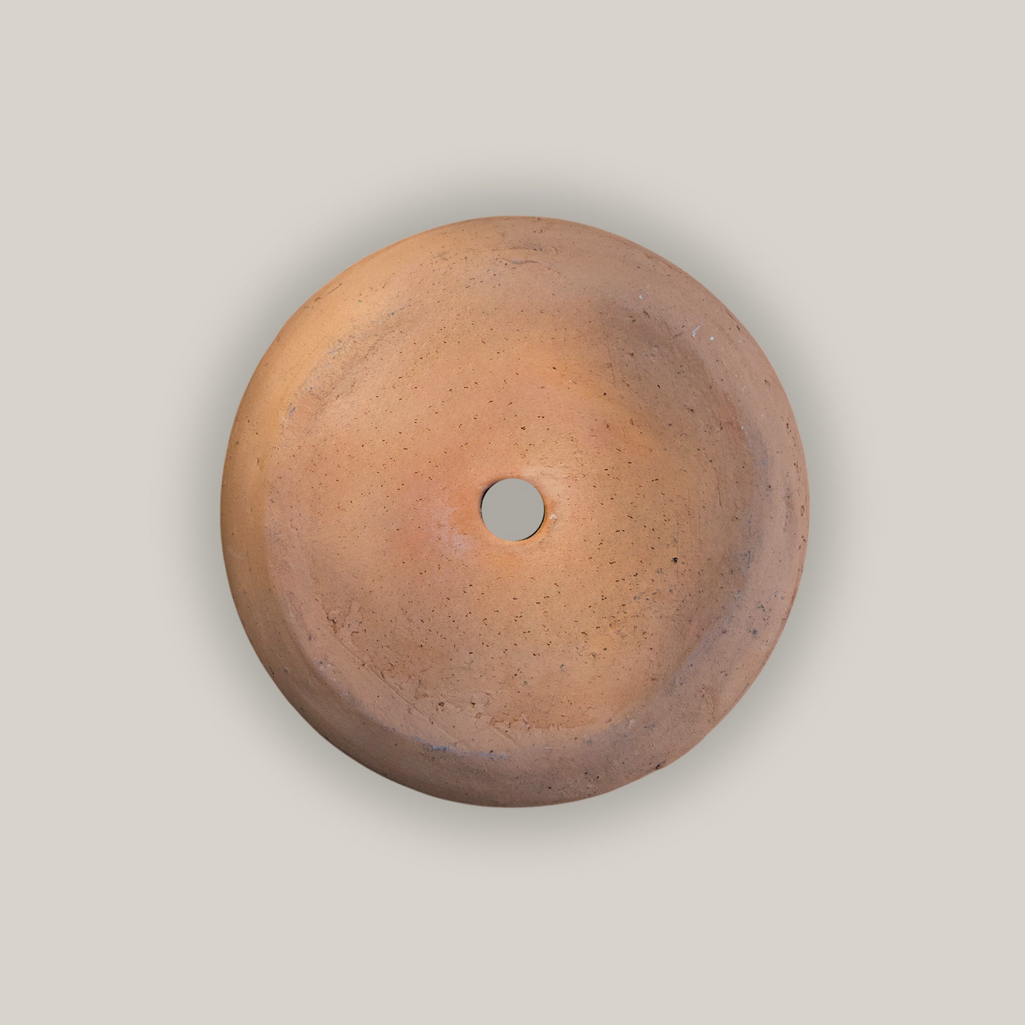 Bottom of Terracotta bird house with natural rustic finish