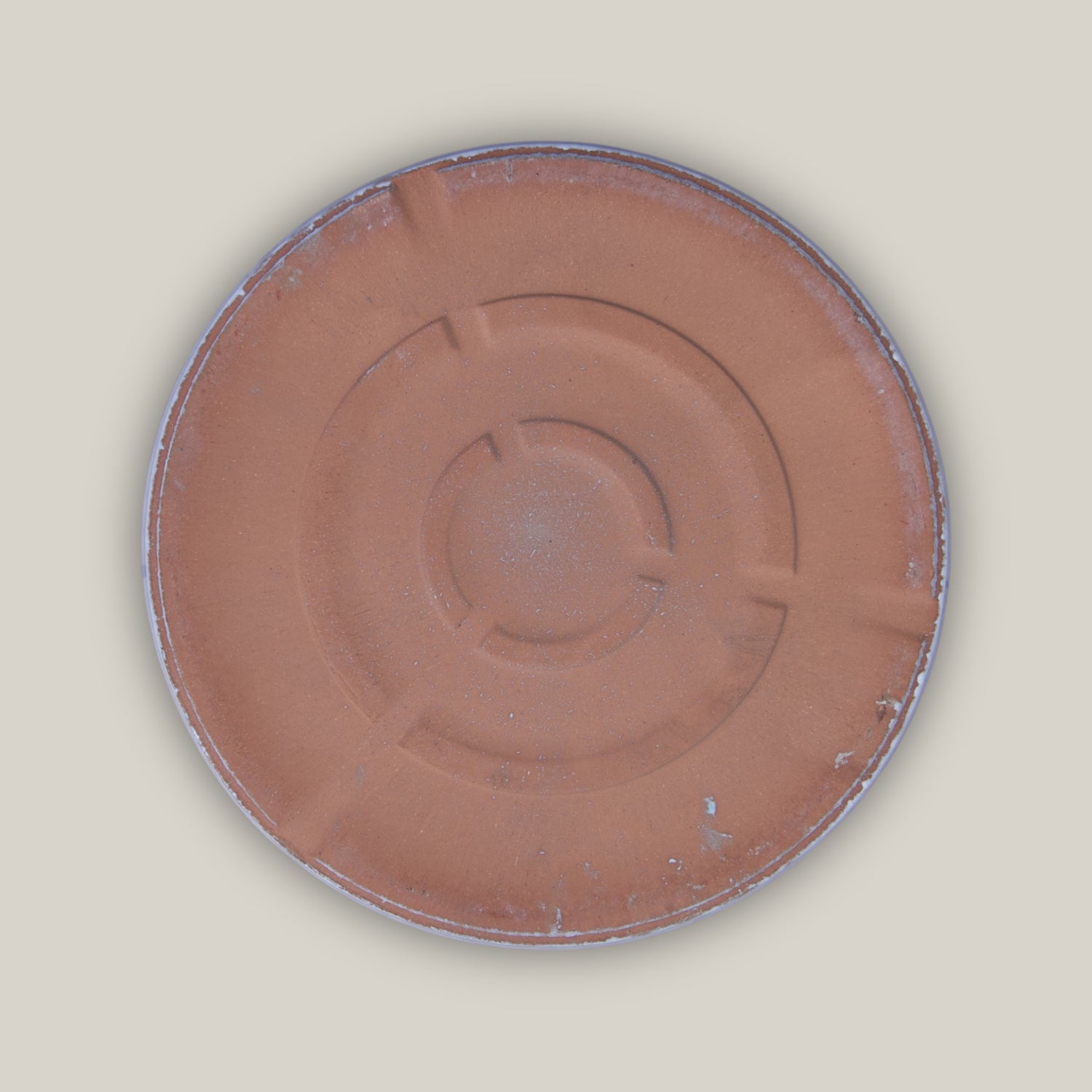 Bottom of White ceramic plant saucer