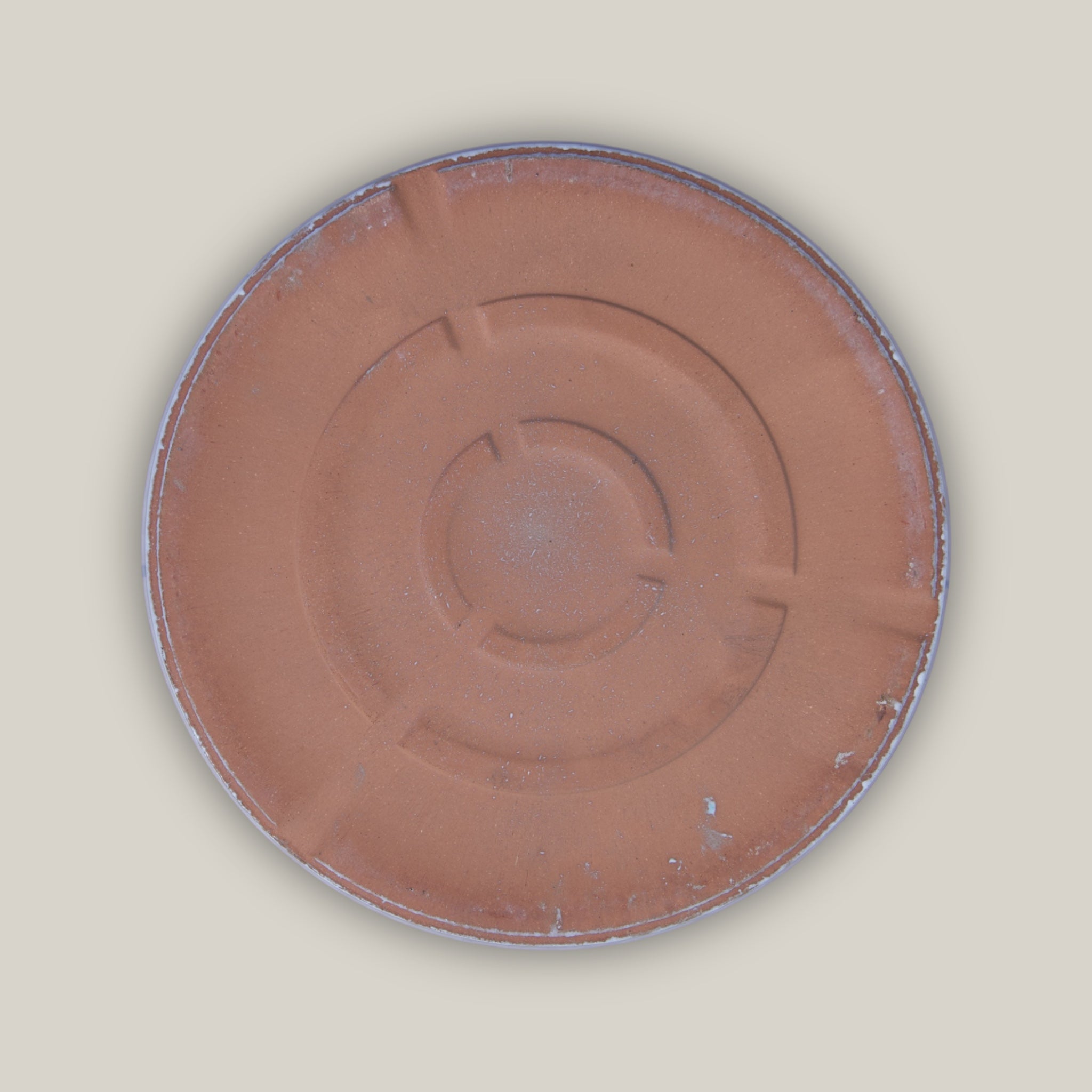Bottom of White ceramic plant saucer