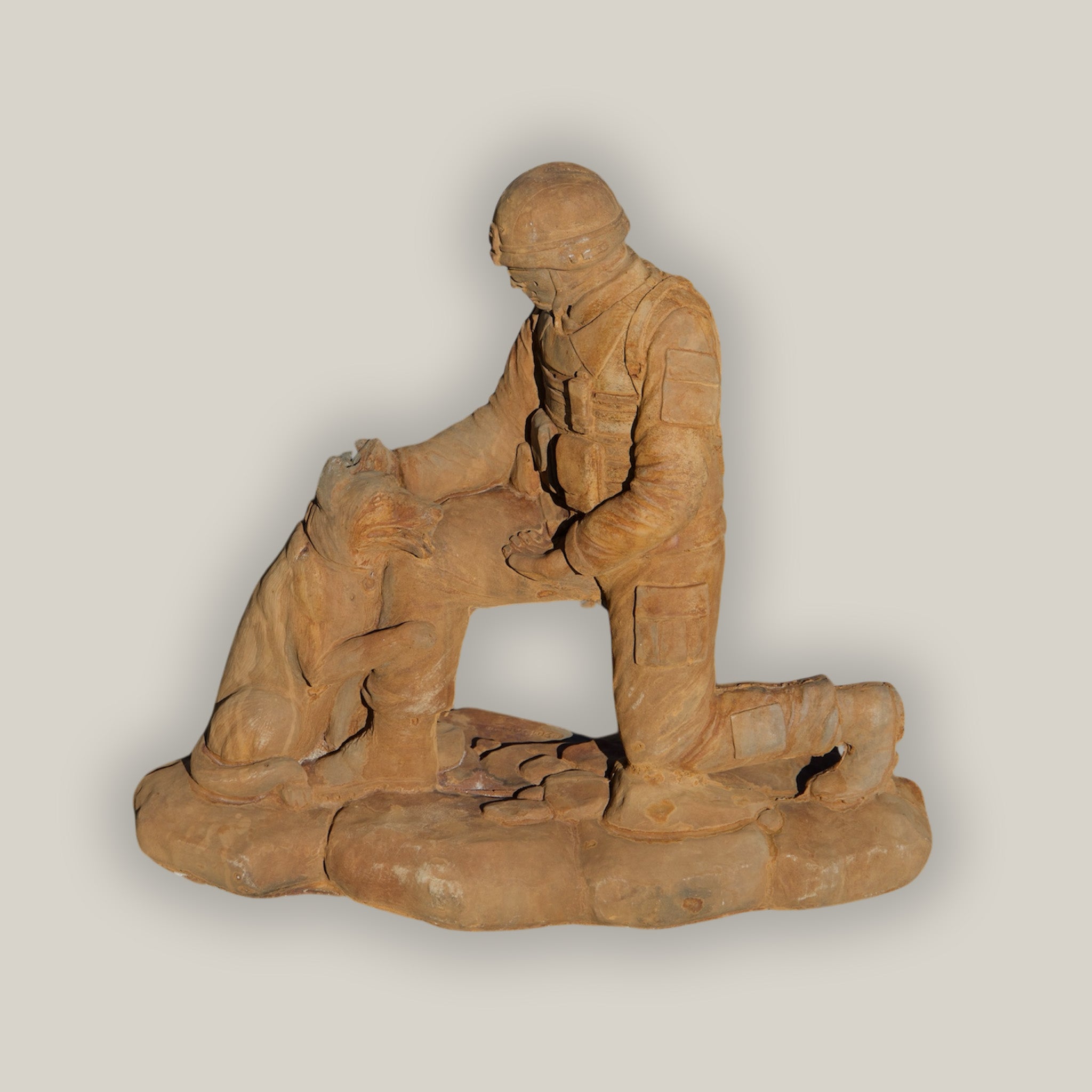 Soldier with Dog Sculpture