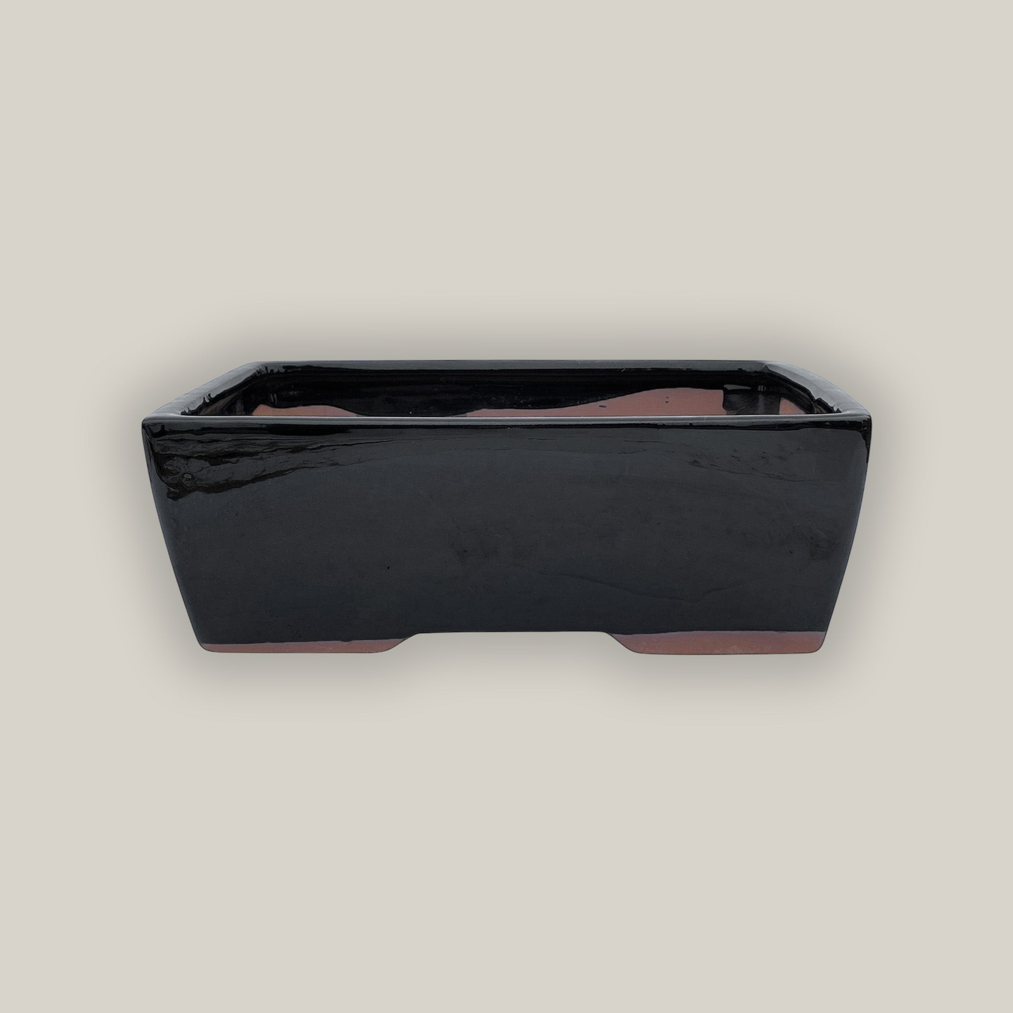 Black rectangular bonsai pot with drainage holes and wire