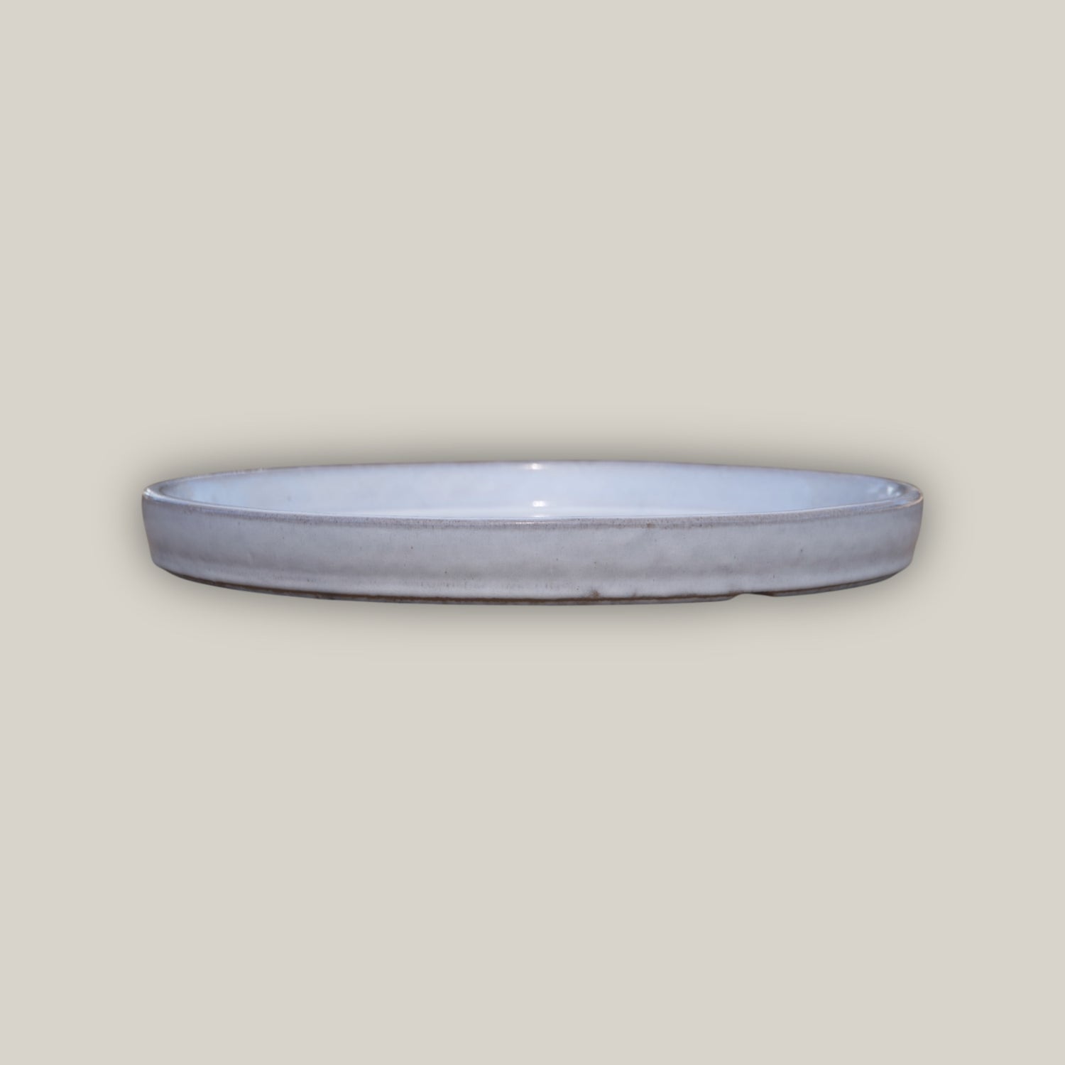 White ceramic plant saucer made from ecofriendly clay