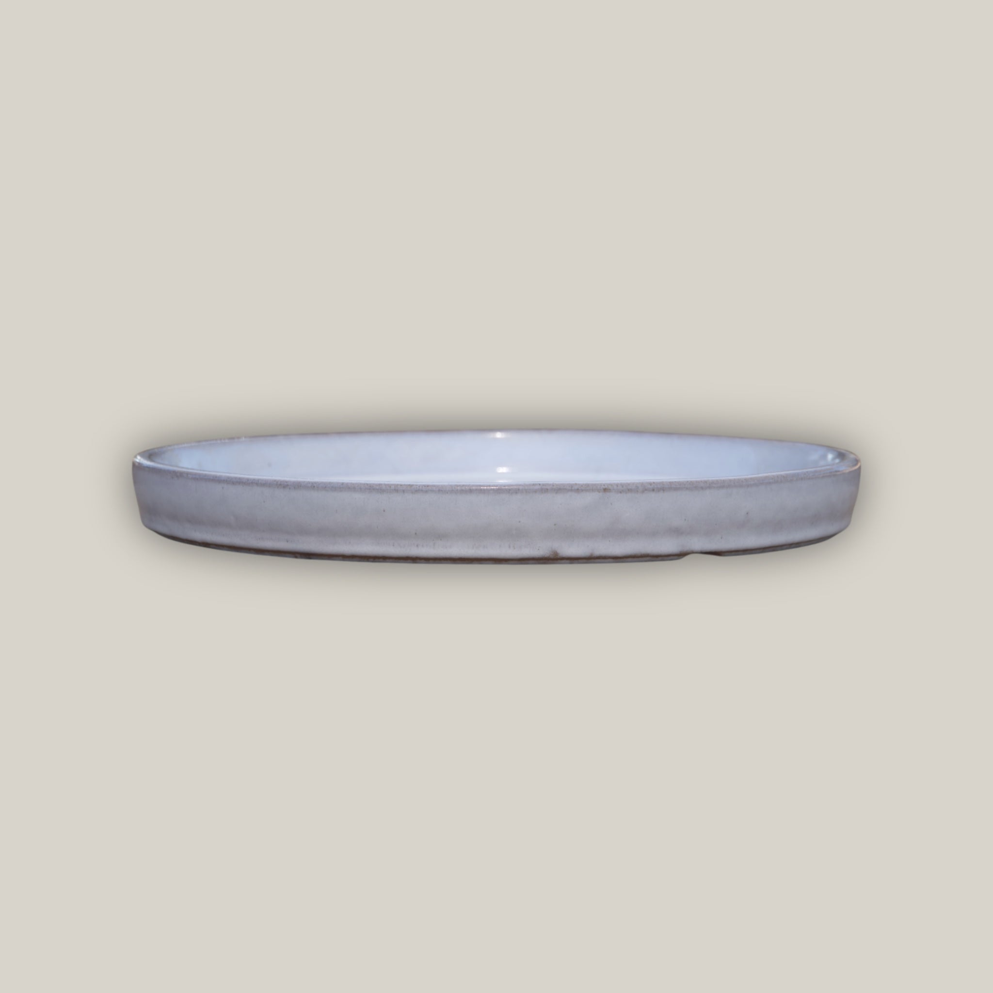 White ceramic plant saucer made from ecofriendly clay