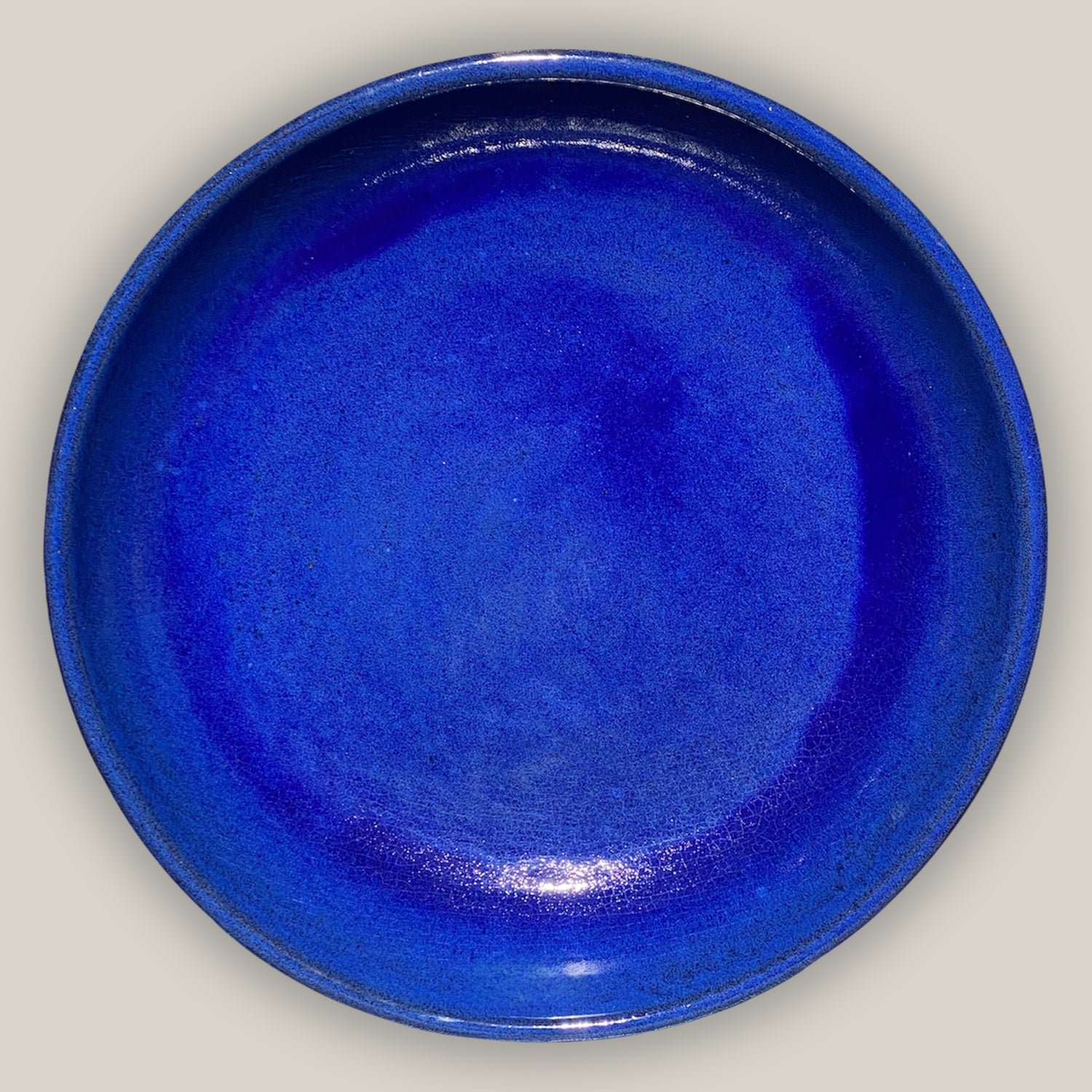 Blue ceramic birdbath bowl with hand-glazed finish