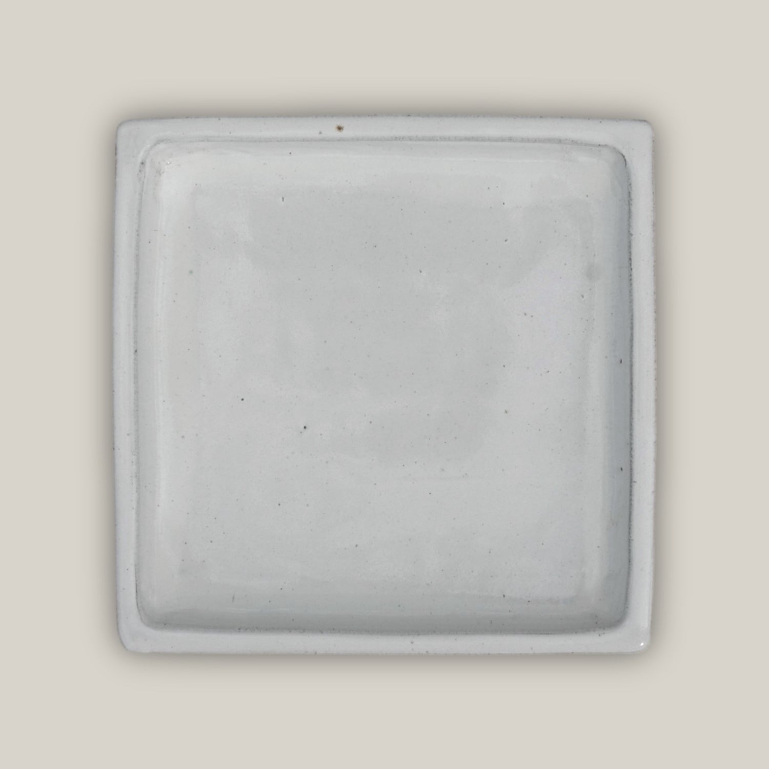 White square plant saucer made from ecofriendly ceramic