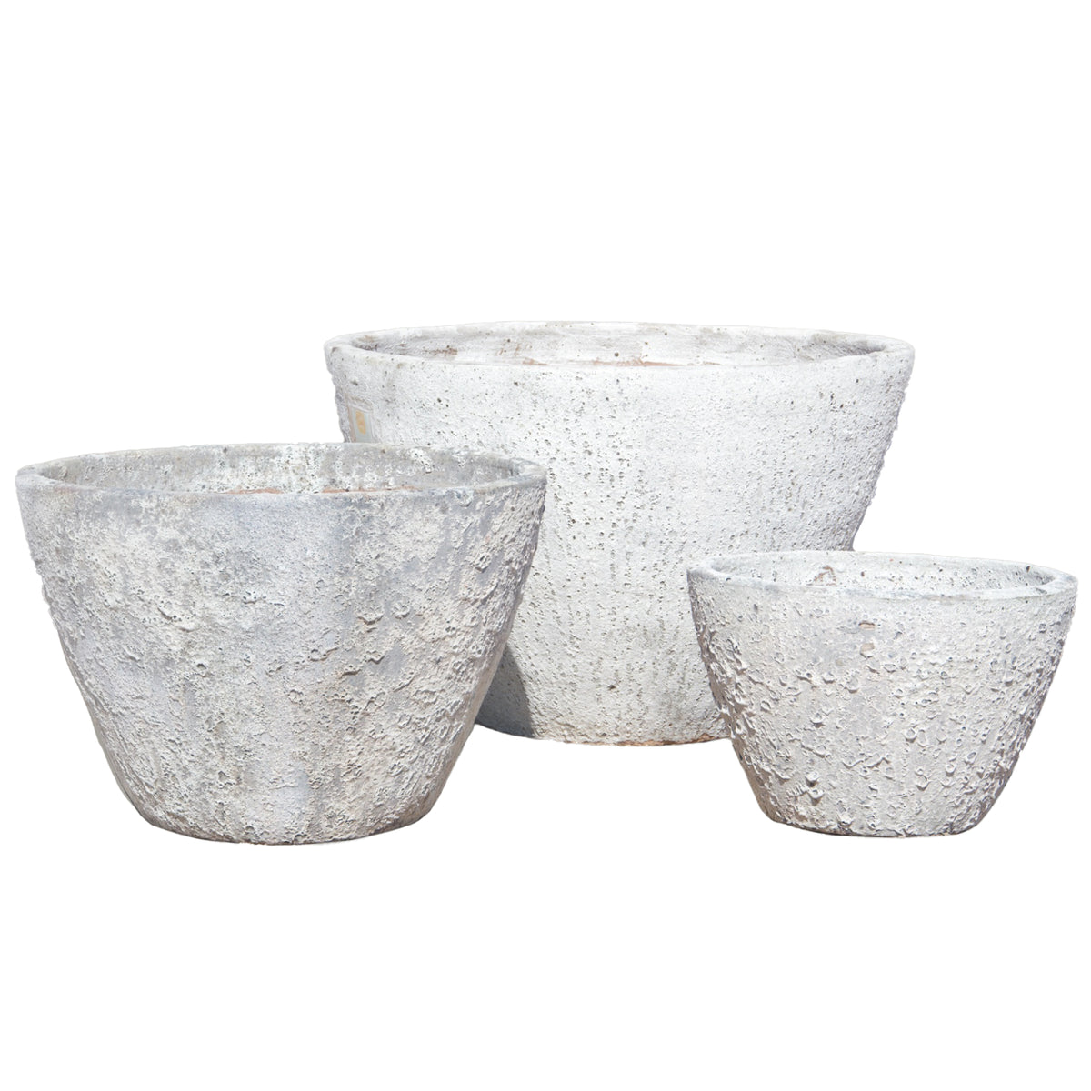 The Atlantis White Rustic Giant Cone Ceramic Planter in three sizes side by side, showing off that same softly weathered white cone silhouette scaled from compact to statement-making.