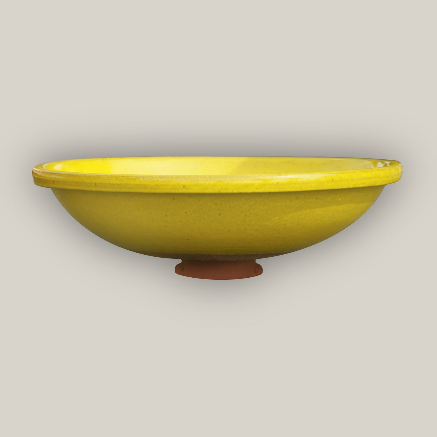 Yellow ceramic bird bath bowl