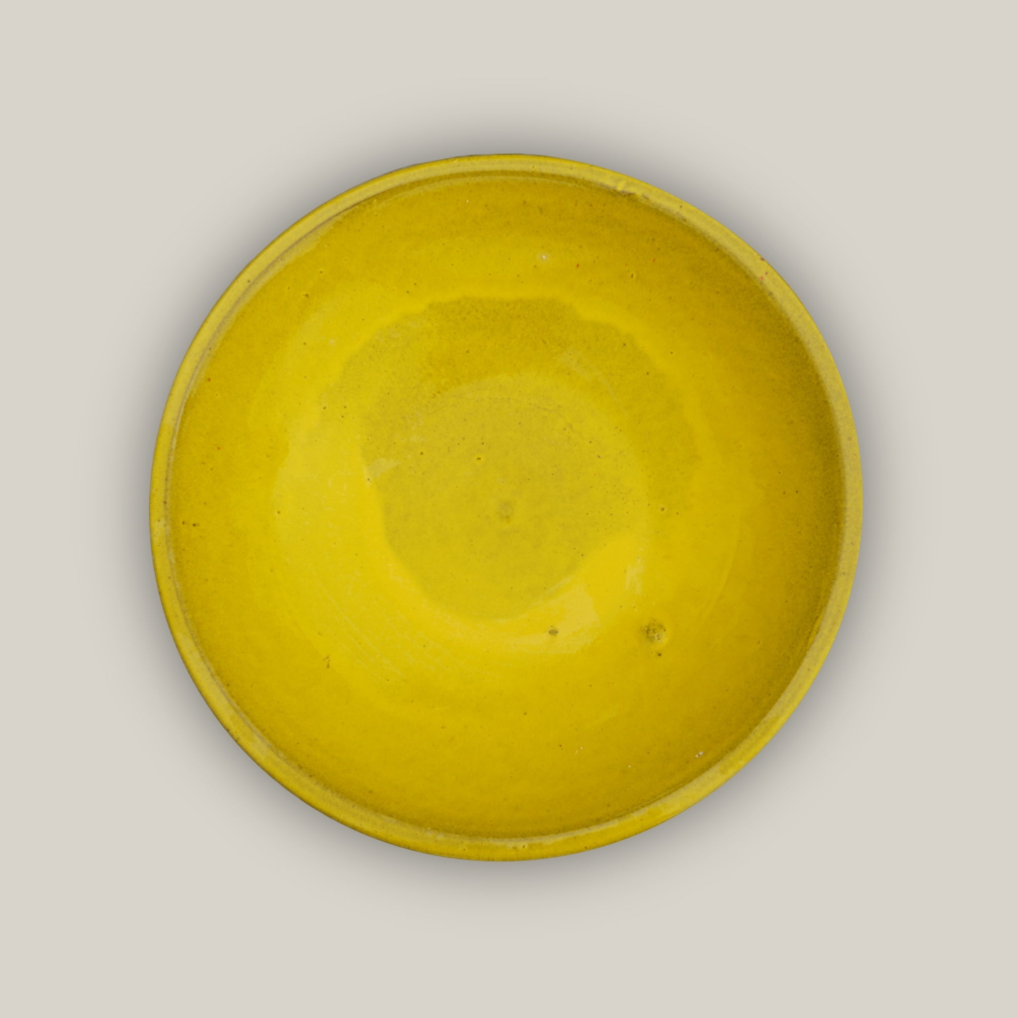 Top view of Yellow ceramic bird bath with hand-glazed finish