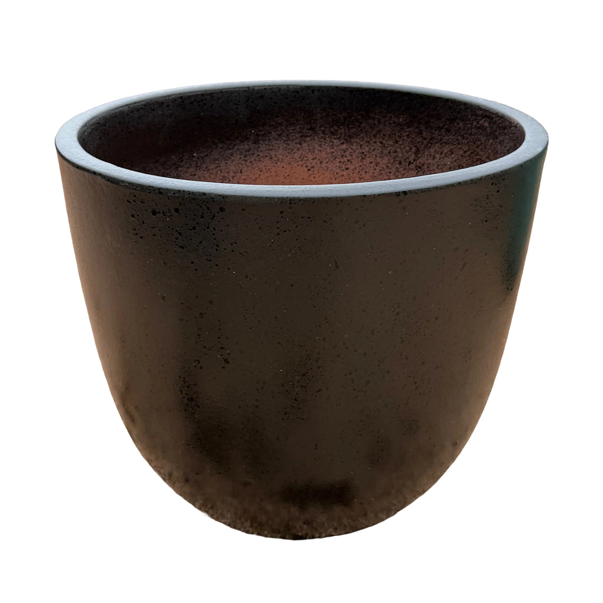 Angled view of a black tapered round ceramic planter, showing its pitted dark exterior, a smooth rounded rim and a speckled interior that shades into terracotta