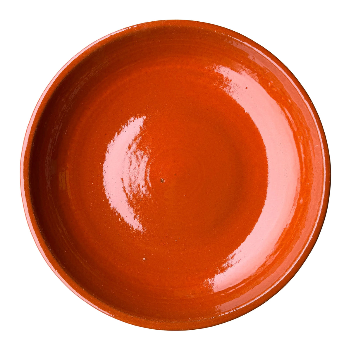 Top-down view of an Atomic Orange ceramic bird bath bowl, showing a wide, glossy basin in solid bright orange with faint throwing rings.