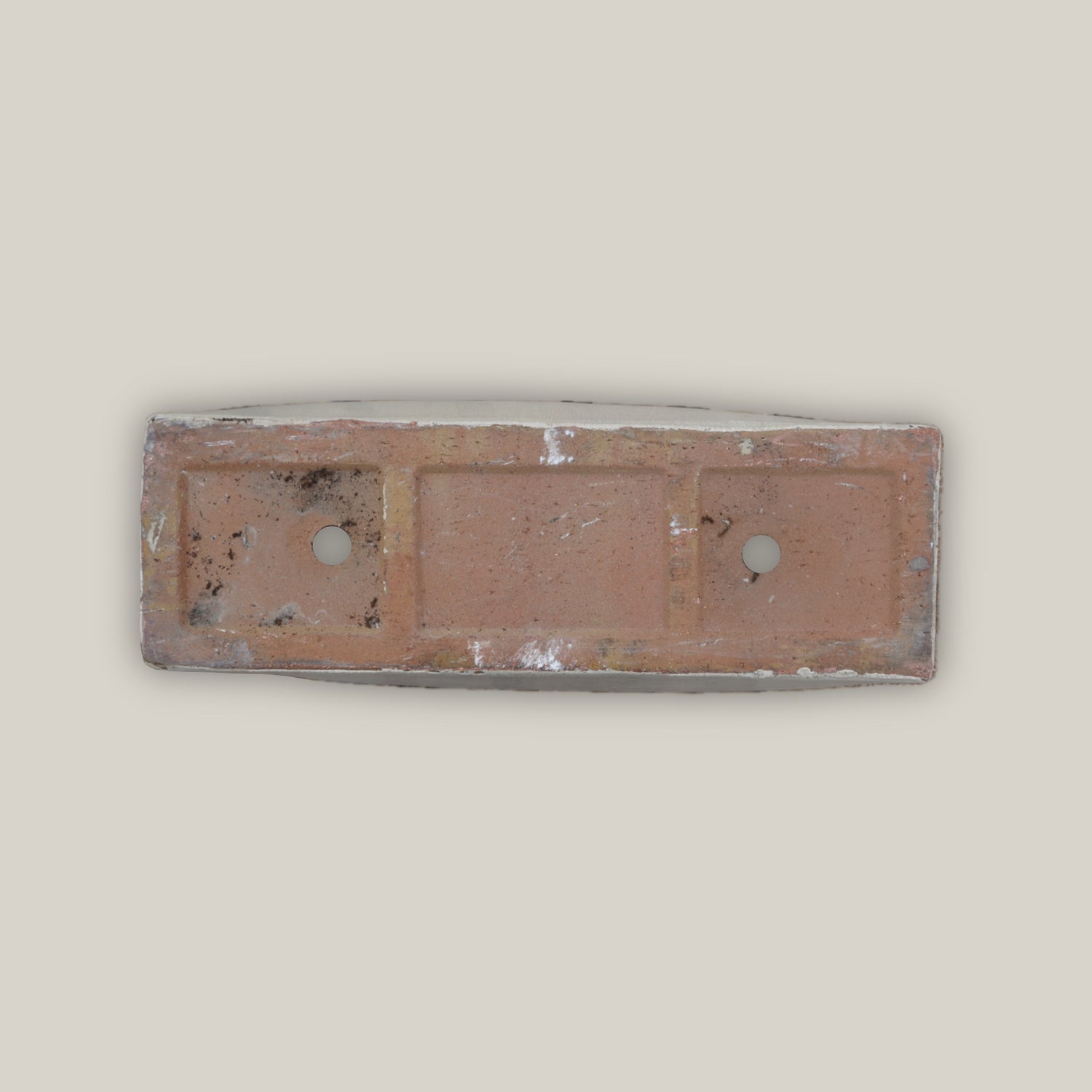 Bottom of Rectangular cream ceramic planter