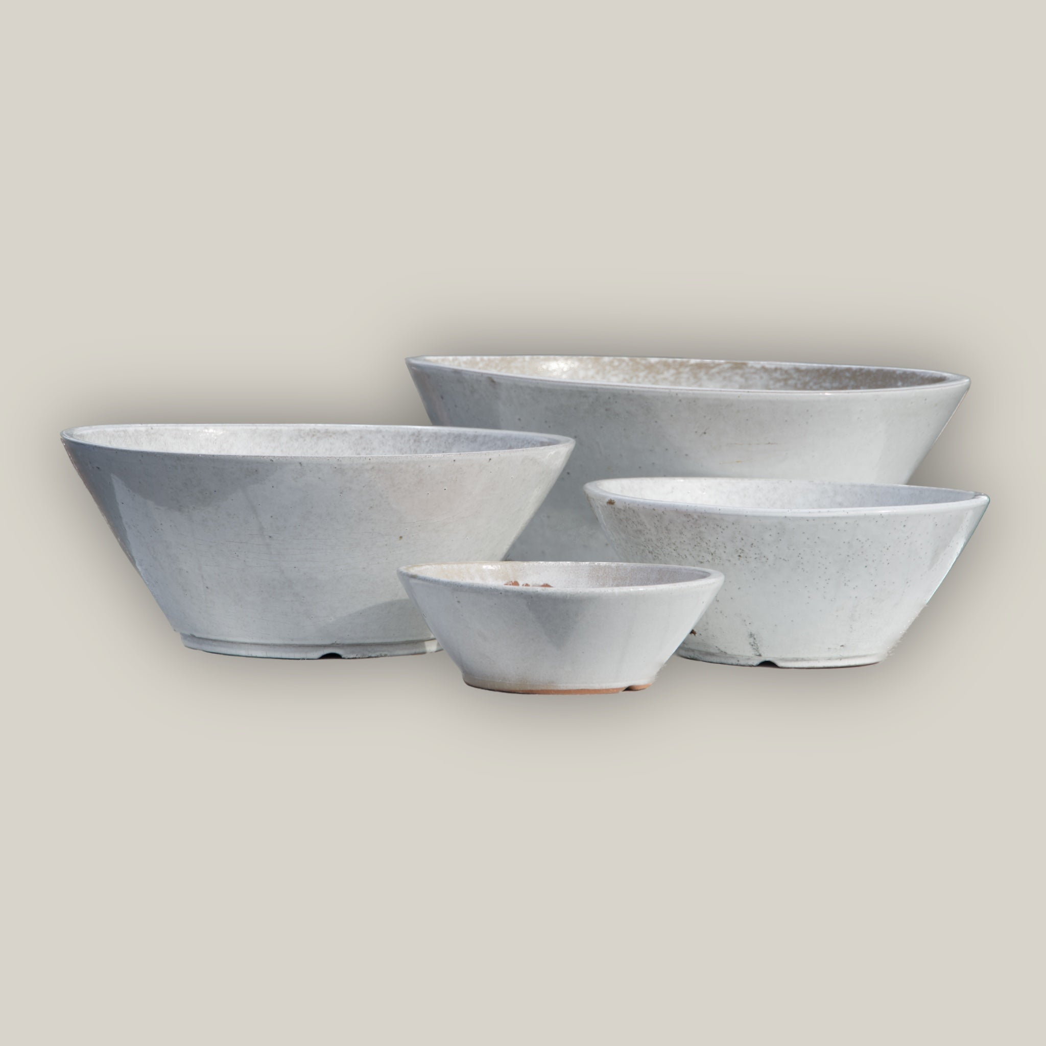 White cone shaped low wide planter set of 4