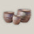 Tapered rustic clay flower pot with three-rim design