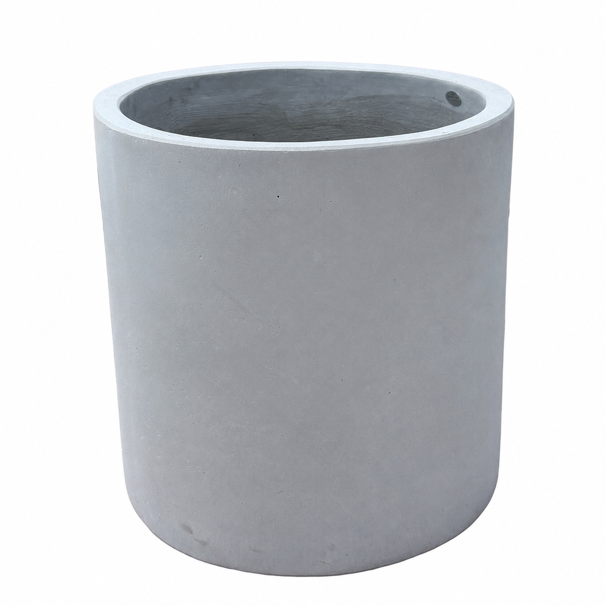 A Light Gray Fiberstone Cylinder Pot tilted forward to reveal its smooth interior, its clean cylindrical body finished in a soft, matte light-grey fiberstone surface.