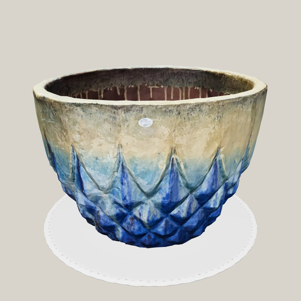 Blue ceramic pineapple bowl with rustic cream top