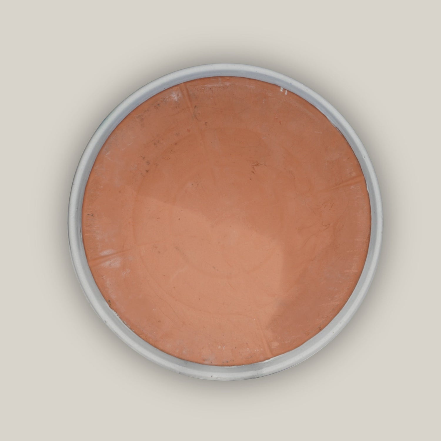 Bottom of Round white plant saucer