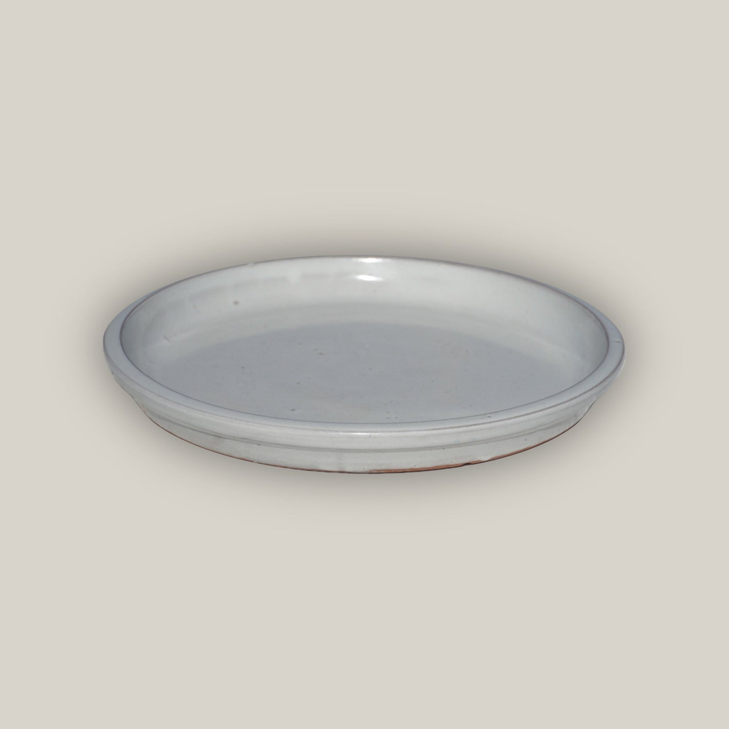 Round white plant saucer made from ecofriendly ceramic