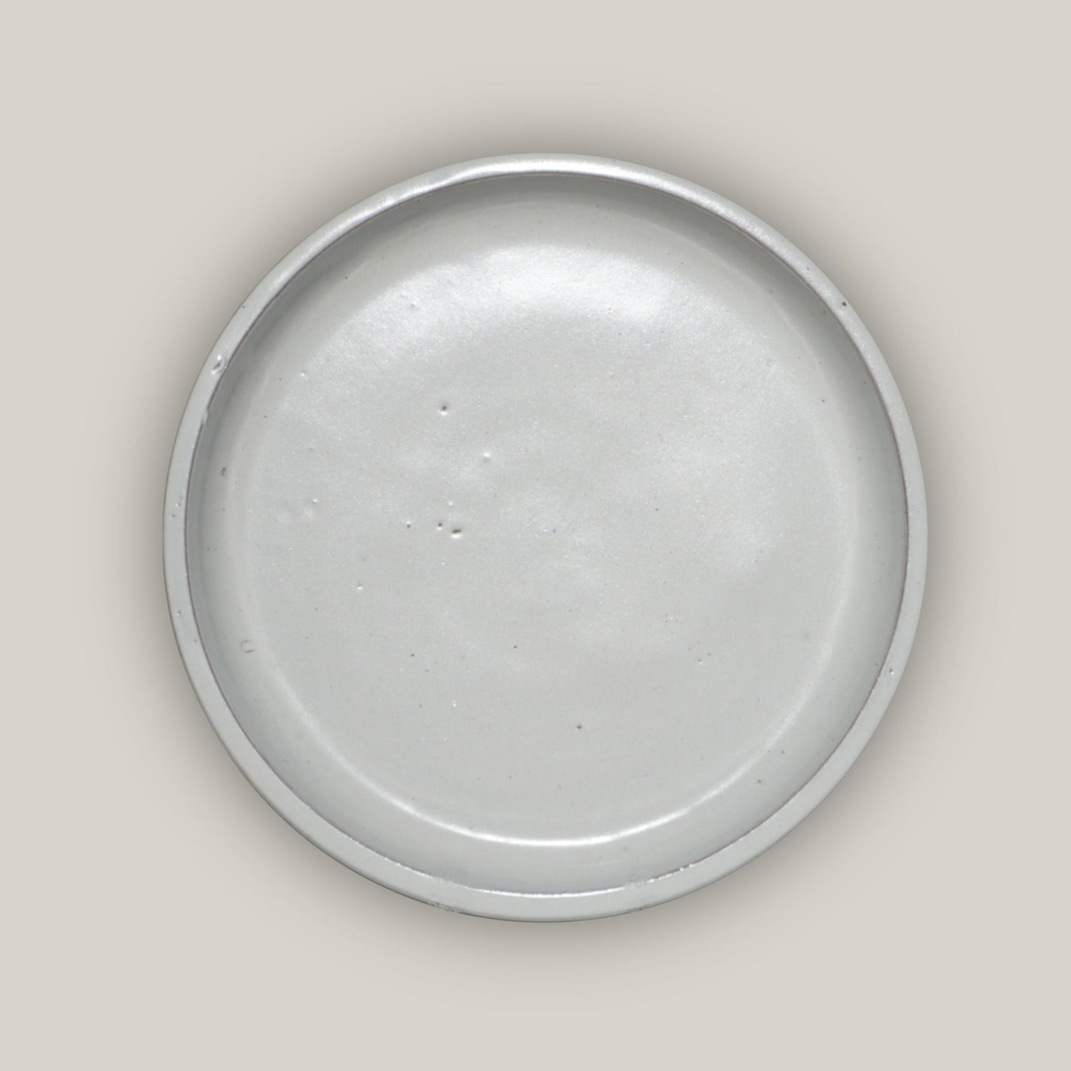 Round white plant saucer made from ecofriendly ceramic
