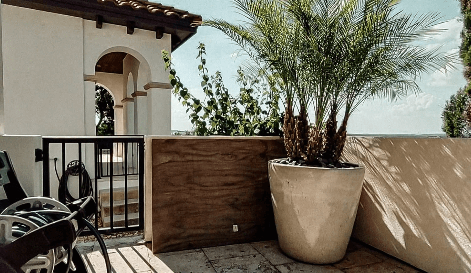 Landscaping featuring ceramic pots as bold statement pieces