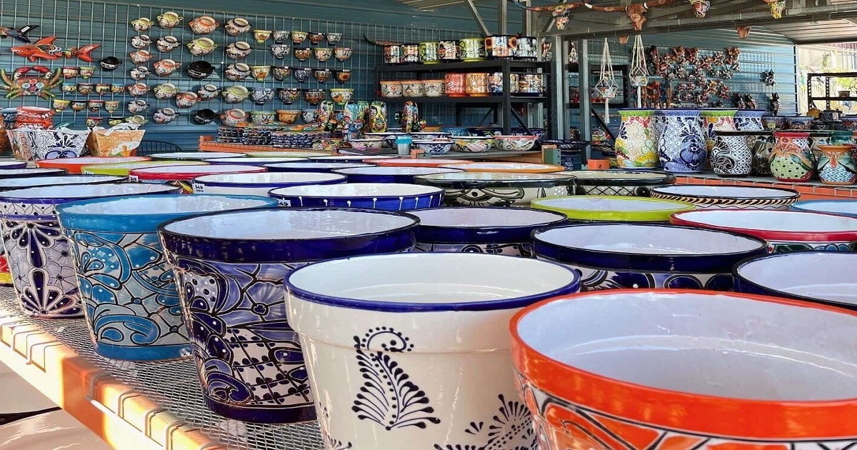 Handcrafted multicolored Mexican Talavera animal planters adding playful charm