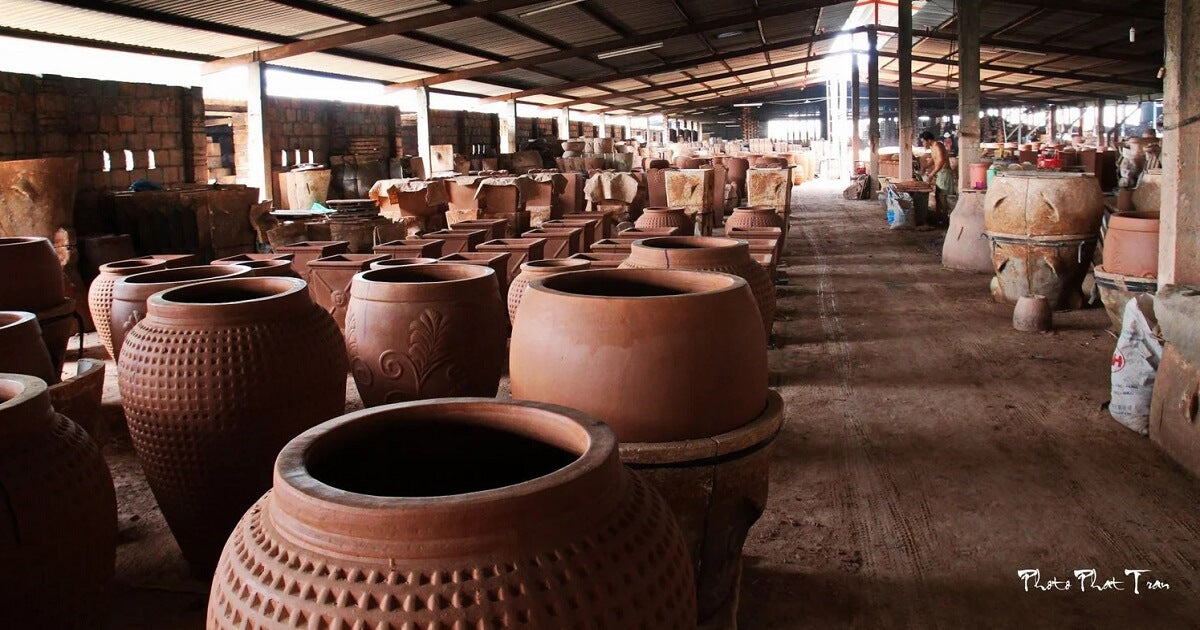 Traditional Vietnamese pottery village with handmade clay pots