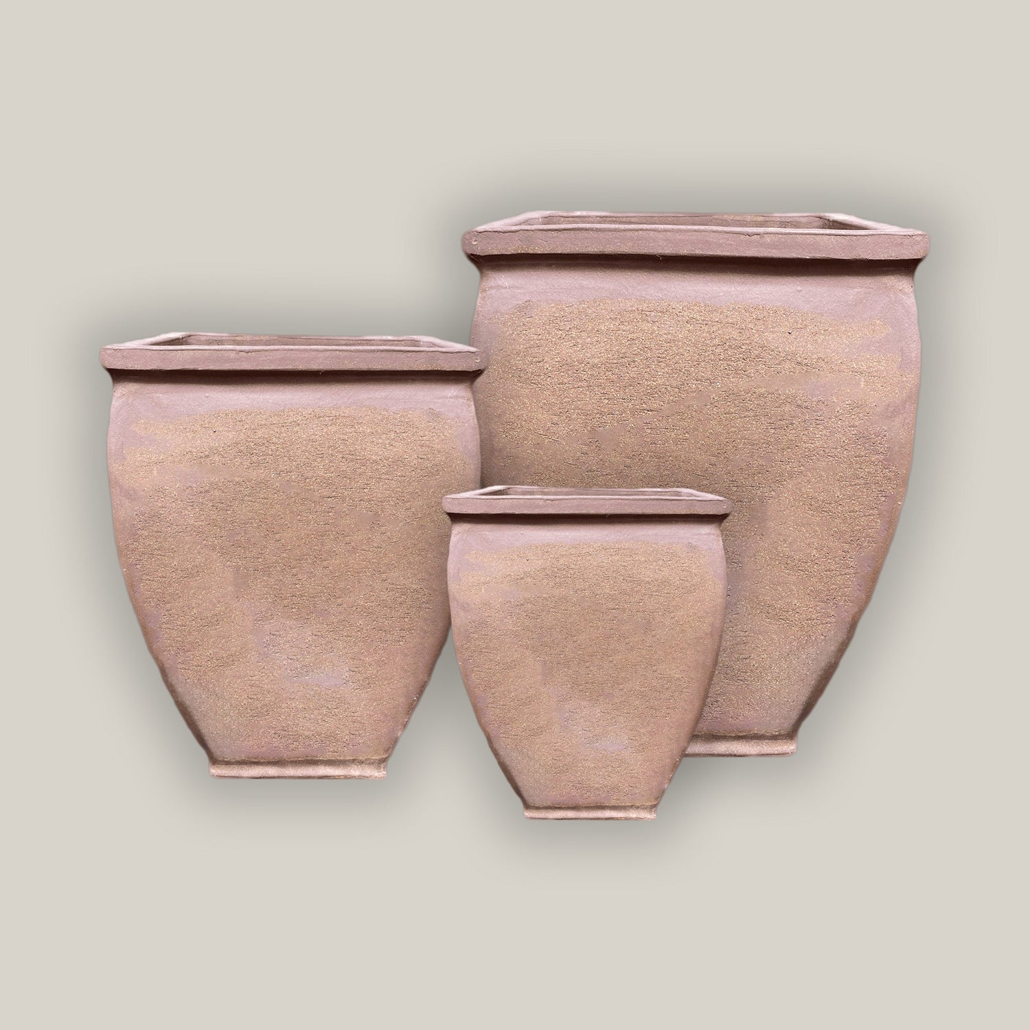 light, earthy brown ceramic pots set