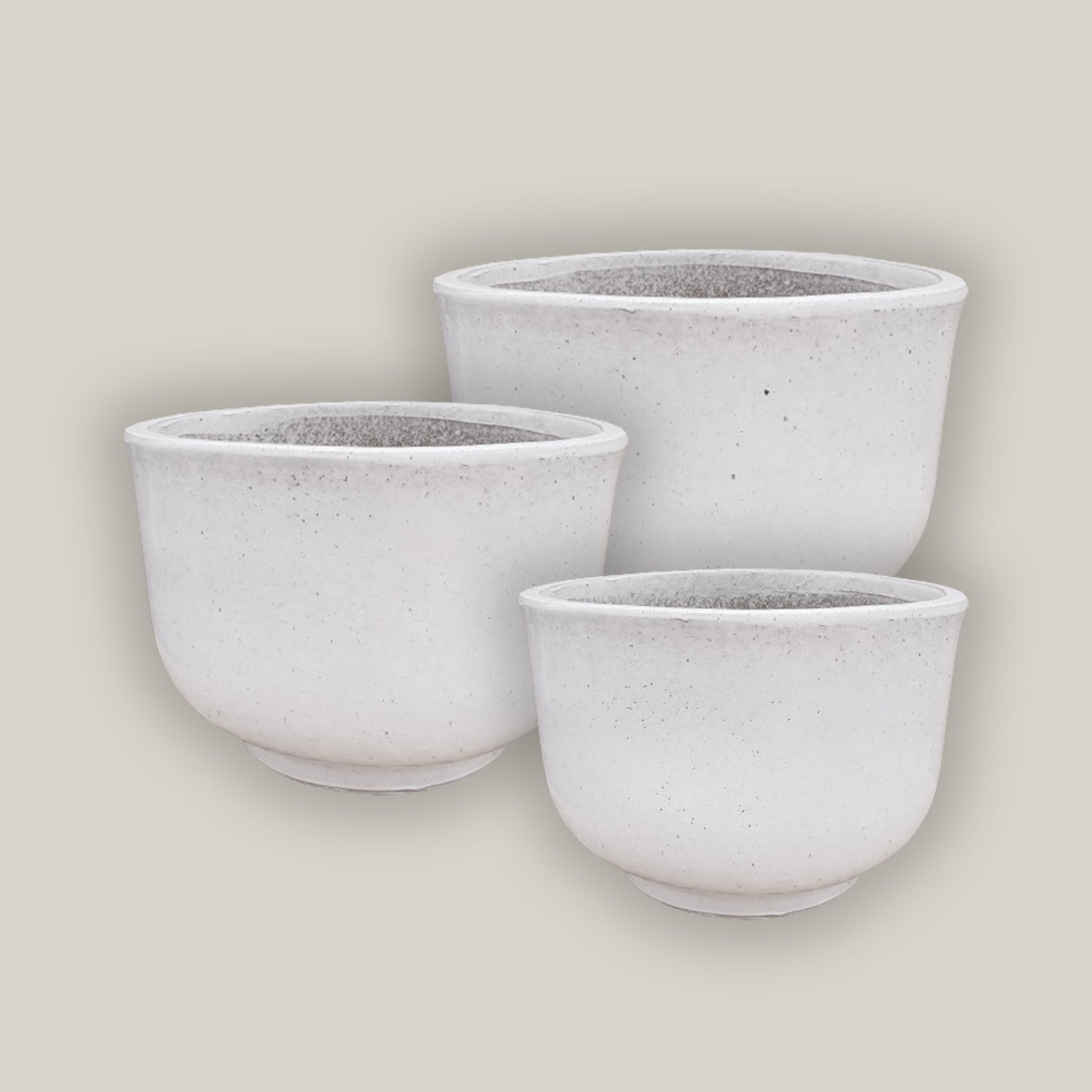 Round ceramic planters in matte white