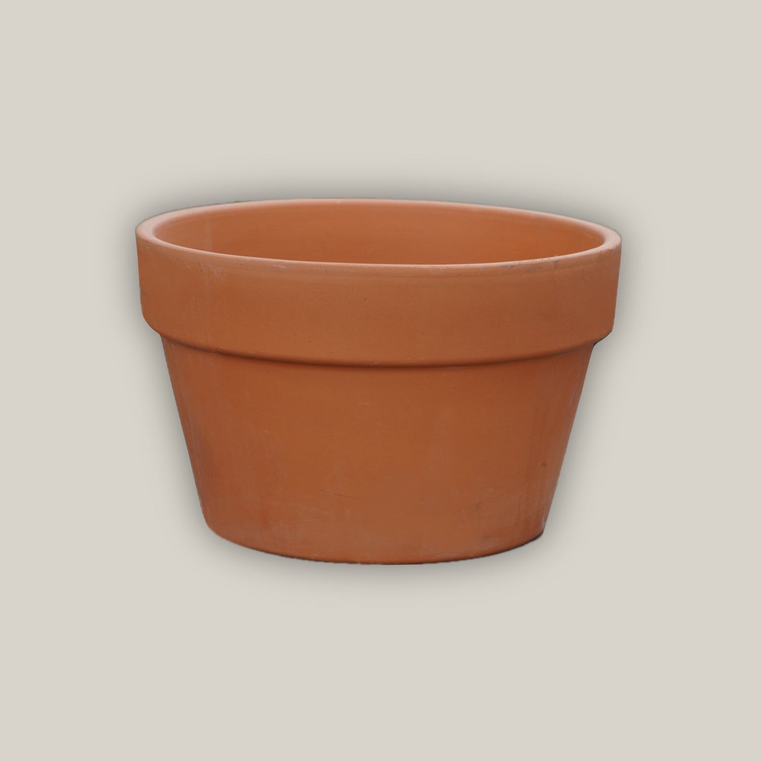 Short wide rim terracotta flower pot