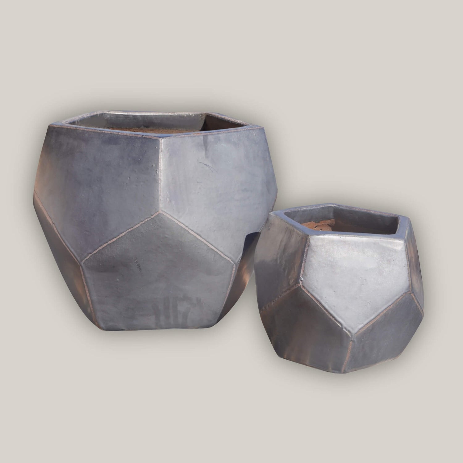 Neutral gray planters in clean, contemporary shapes
