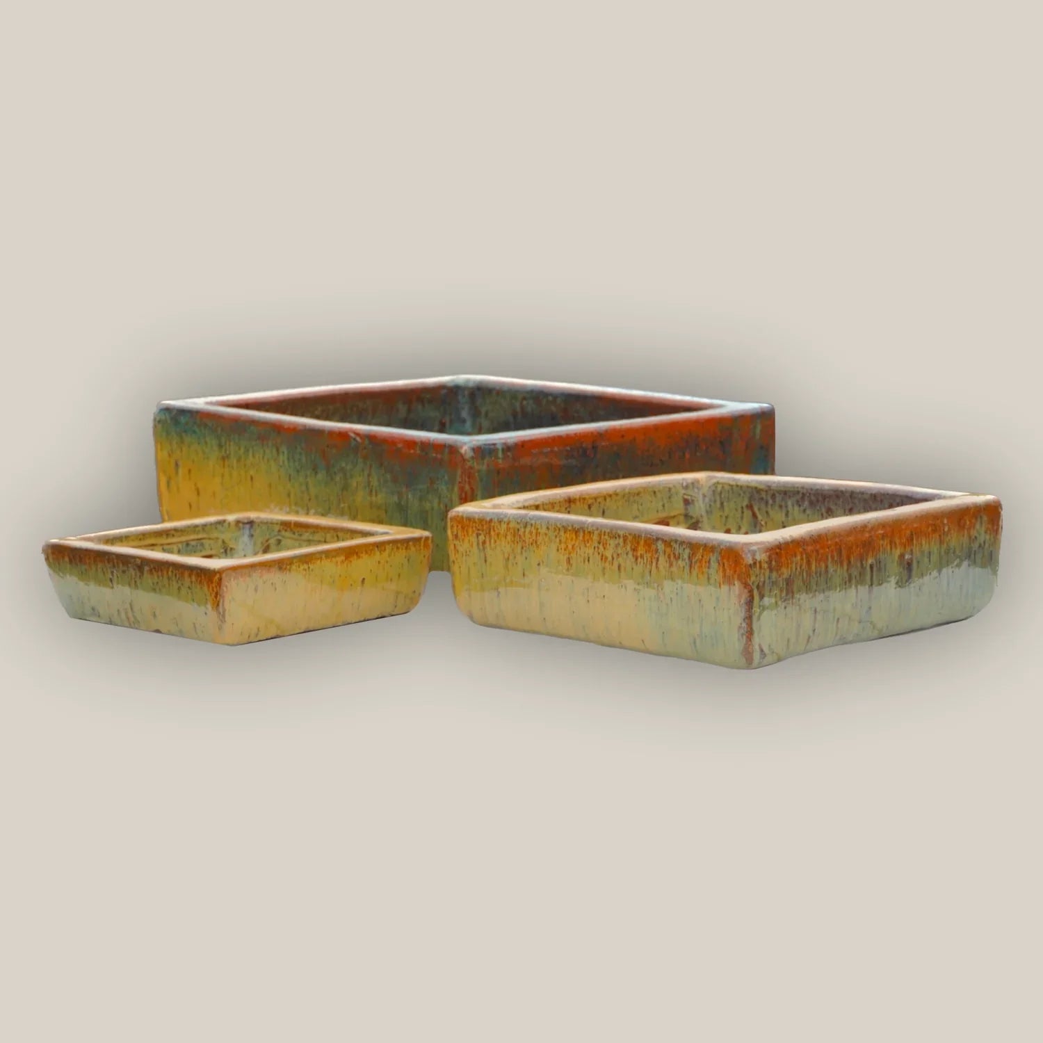 Rustic square planters set in yellow with green and orange tones