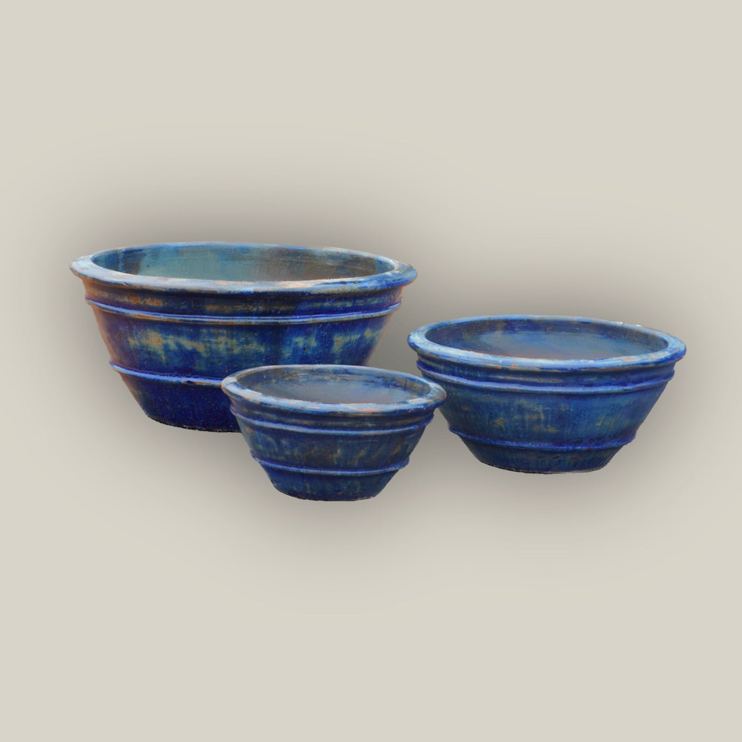 Rounded blue ceramic planters