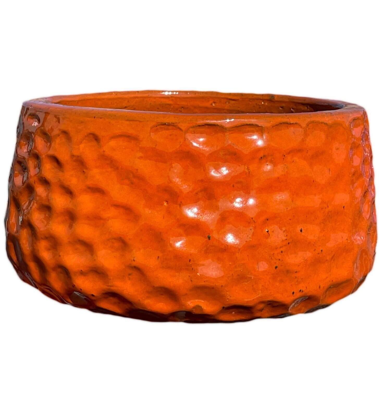 Modern orange planter with dimple design