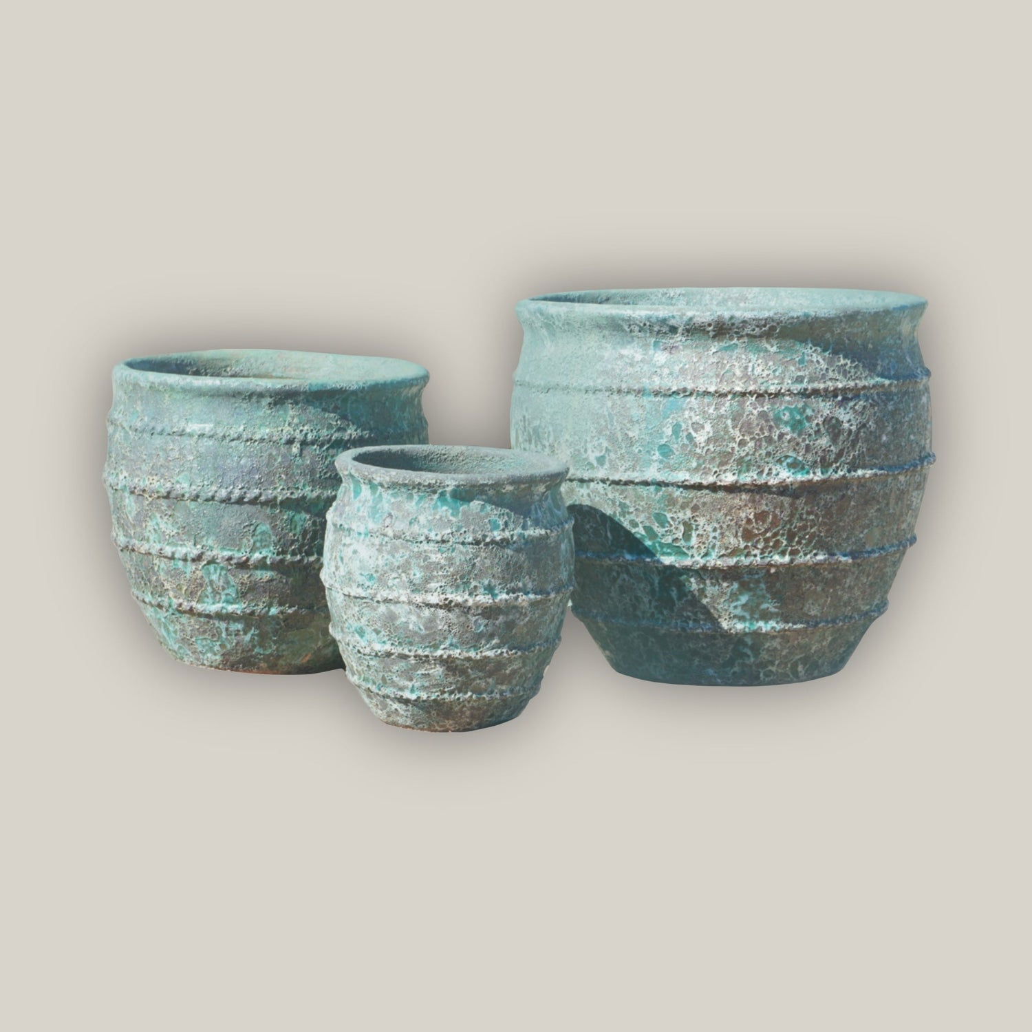 Rustic planters in aqua blue with roped design