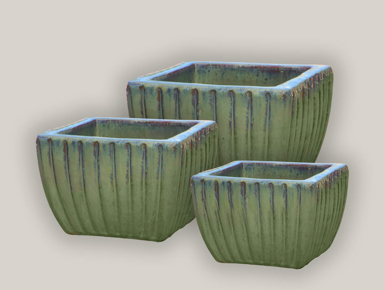 Tapered planter collection with ribbed texture
