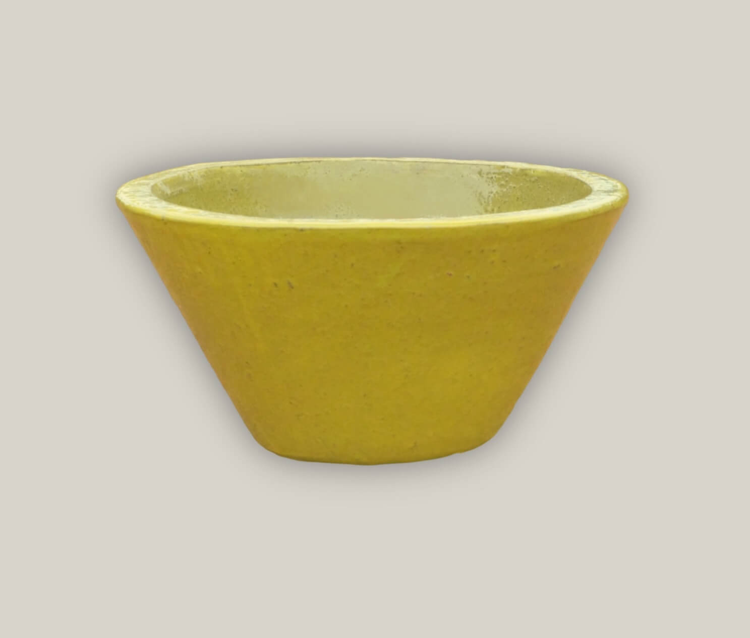 Vibrant yellow planter perfect for indoor and outdoor greenery